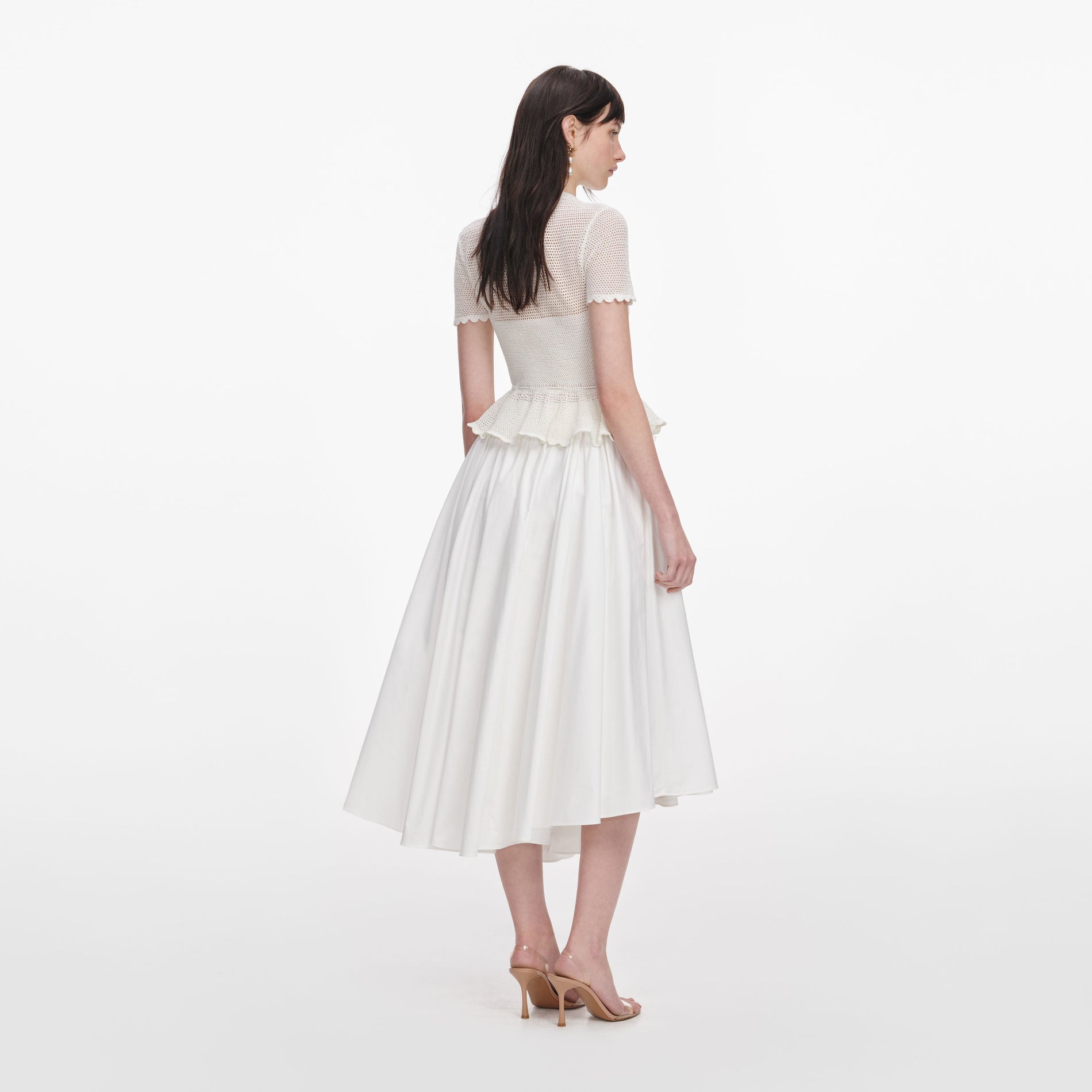 Back view of a woman wearing the White Floral Crochet Top