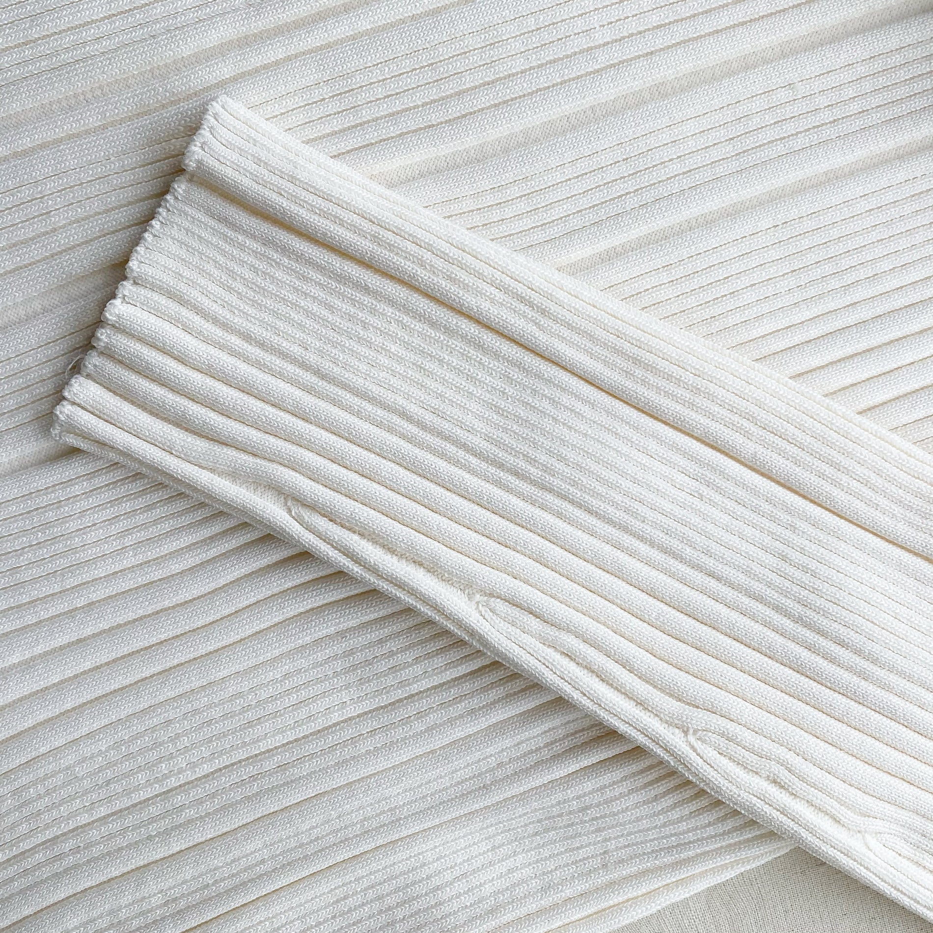 A close up of the fabric for the Ivory Contrast Stitch Knit Dress