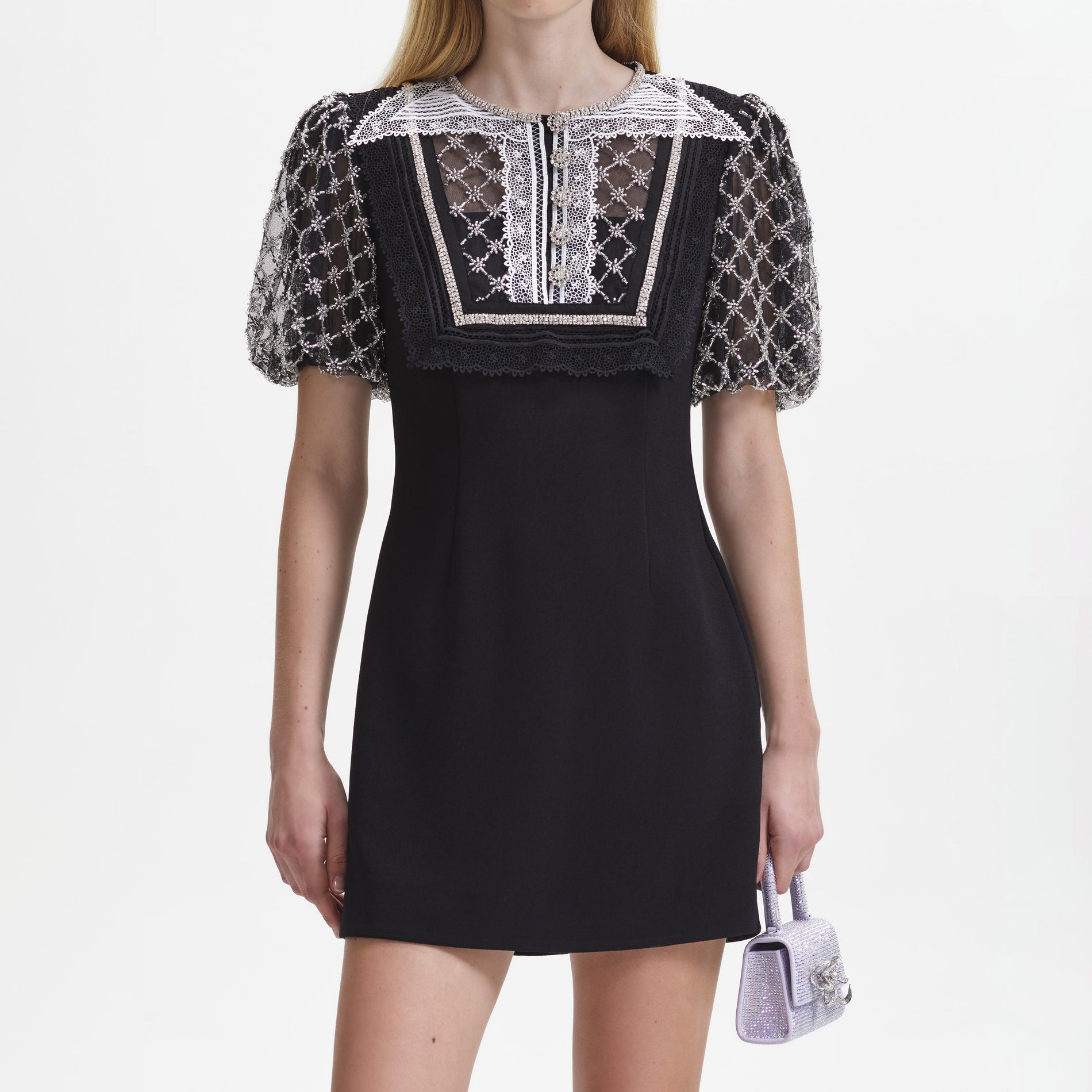 A close up of the fabric for the Black Embellished Puff Sleeve Mini Dress