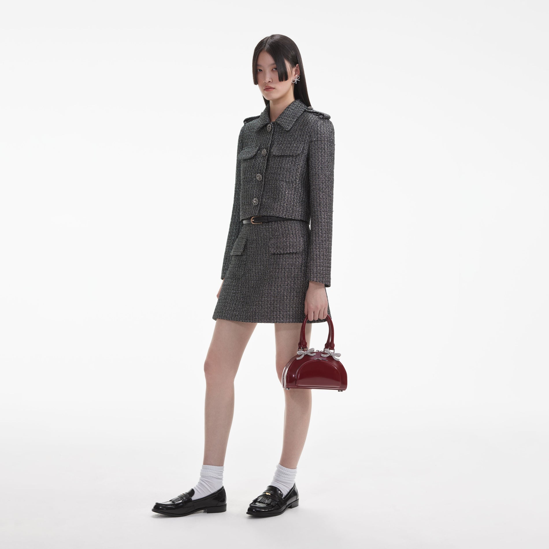 Side view of a woman wearing the Metallic Boucle Jacket