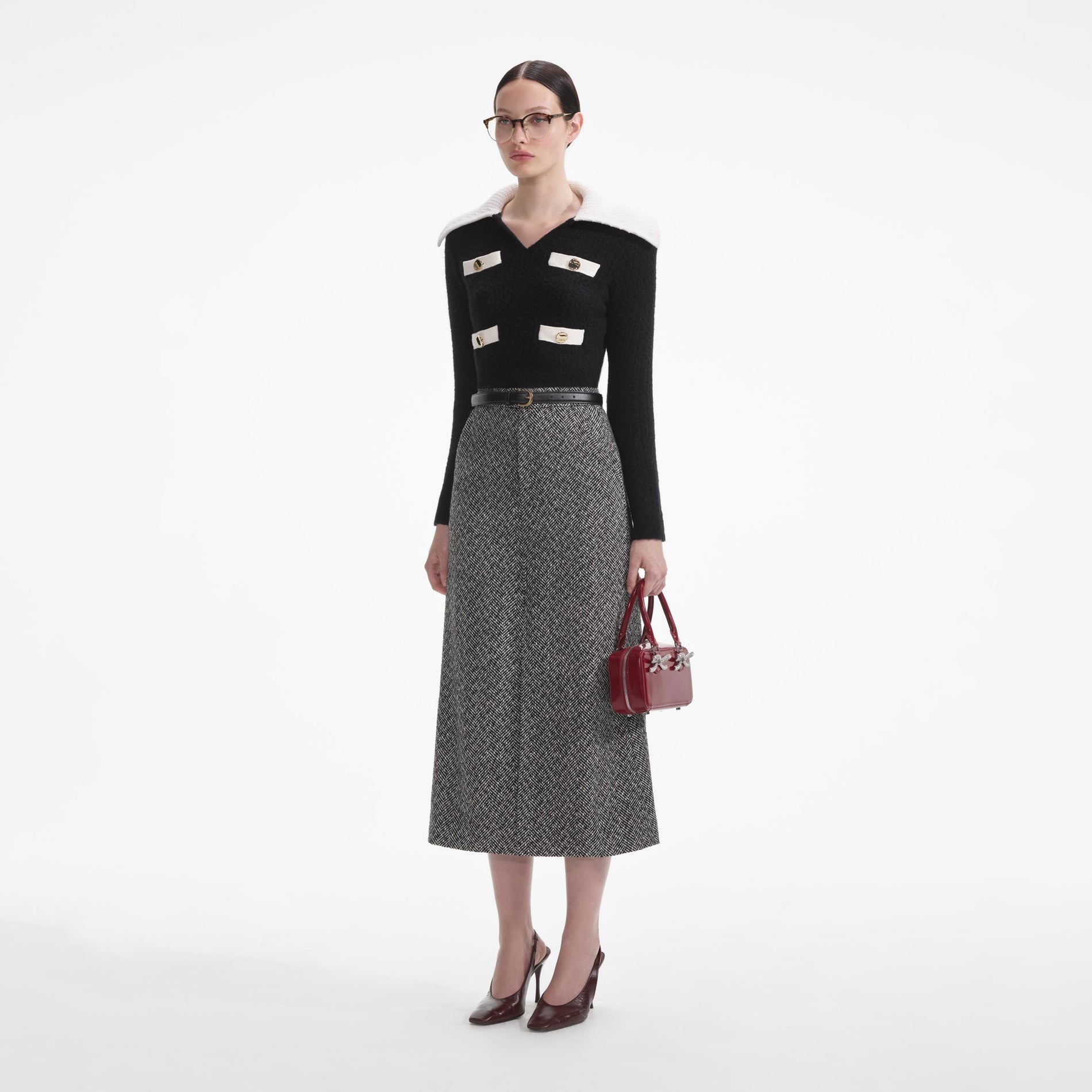 Side view of a woman wearing the Black Cashmere Blend Jumper