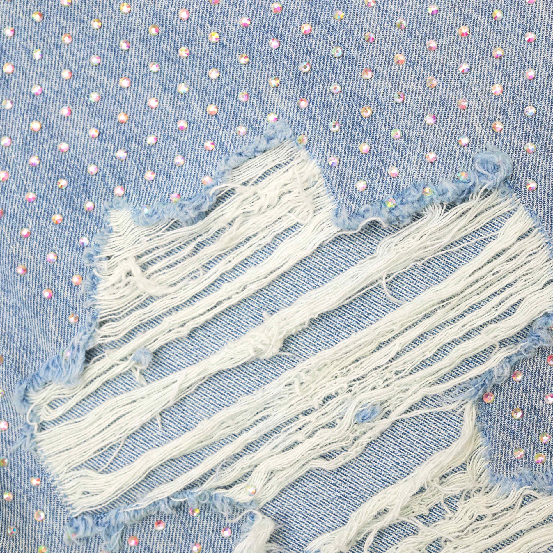 A close up of the fabric for the Rhinestone Ombre Distressed Jeans