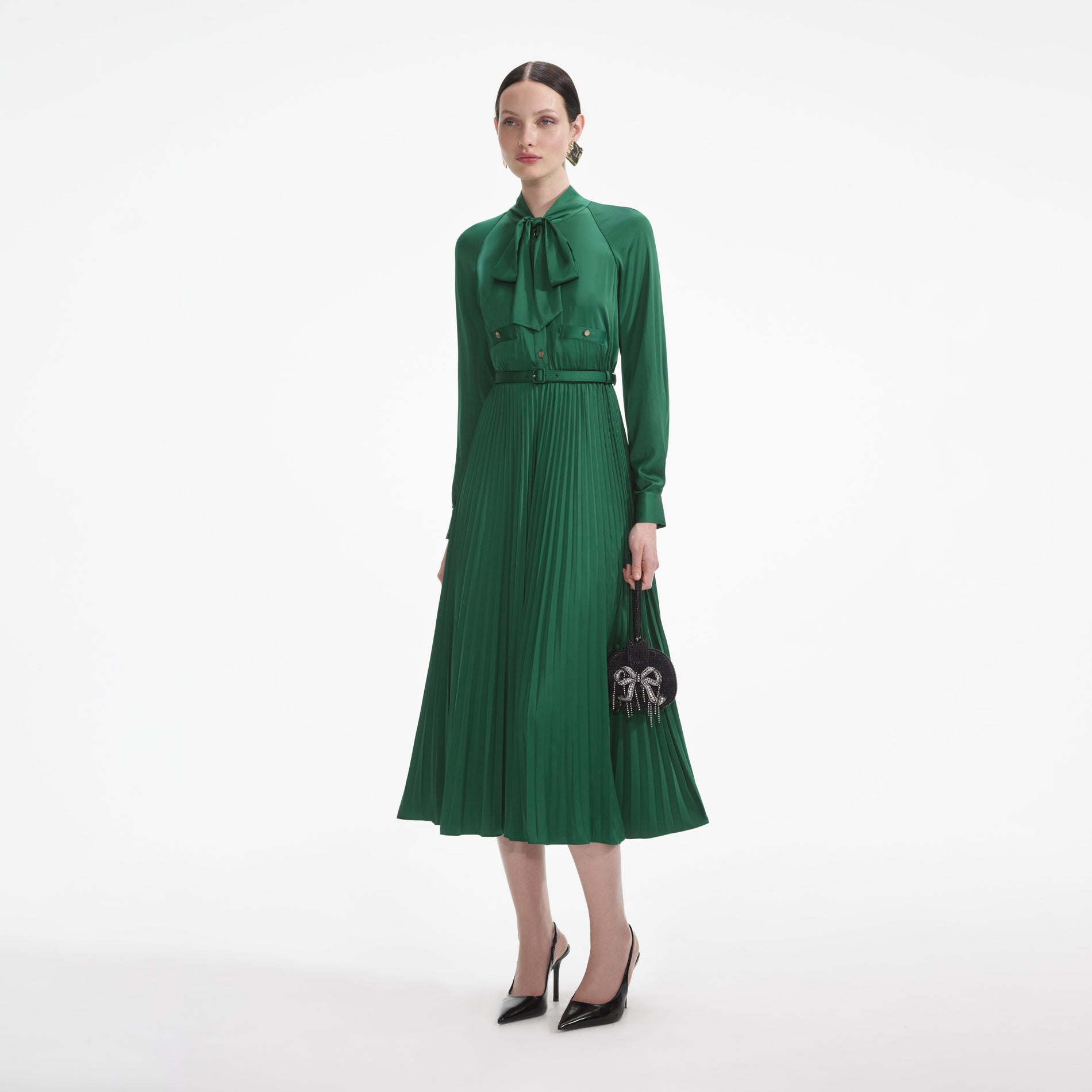 Side view of a woman wearing the Green Satin Midi Dress