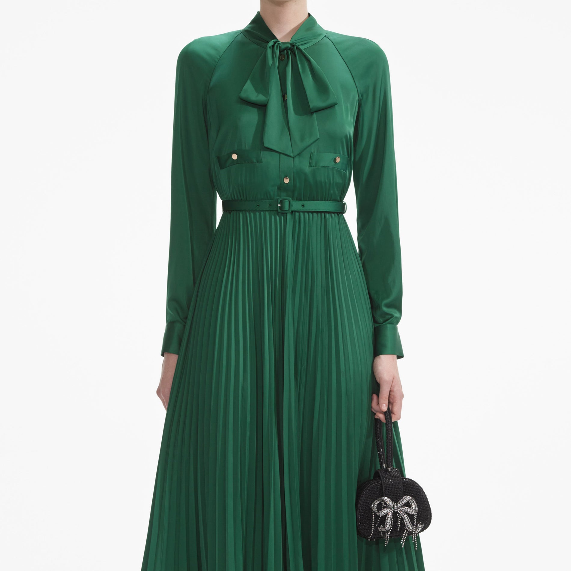 A close up of a woman wearing the Green Satin Midi Dress
