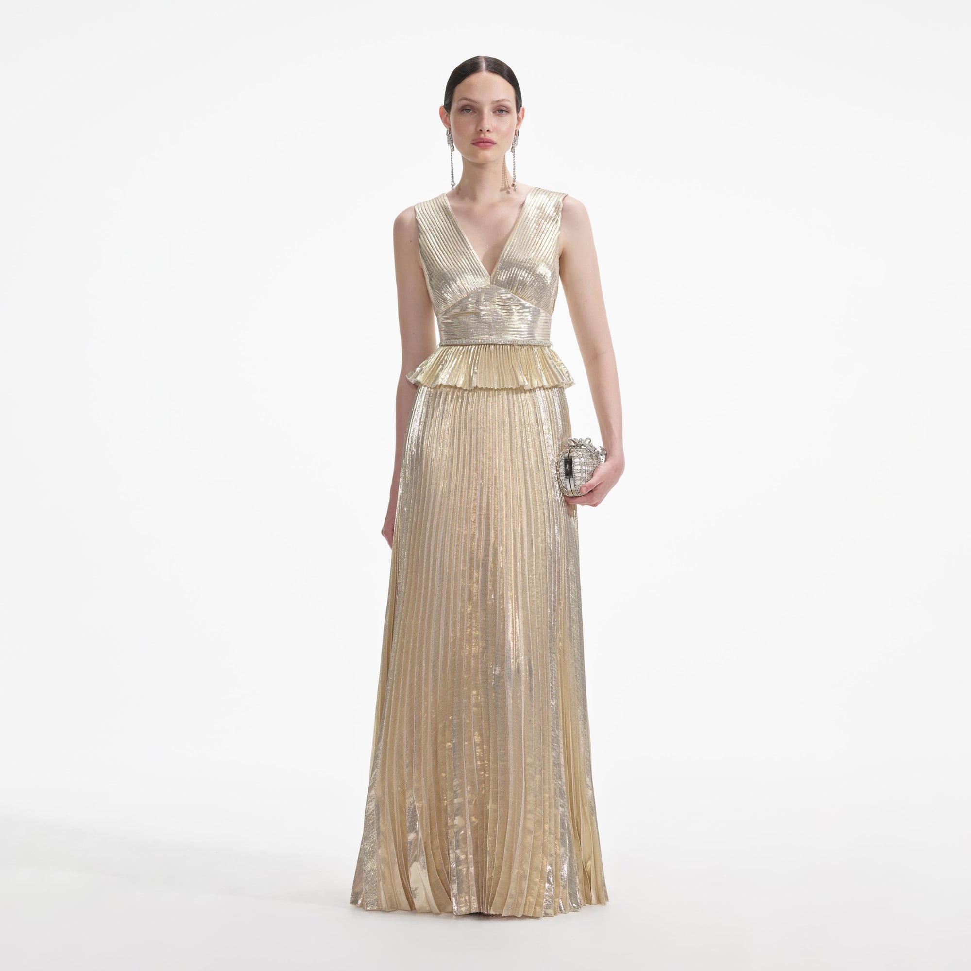Front view of a woman wearing the Gold Metallic V-Neck Maxi Dress