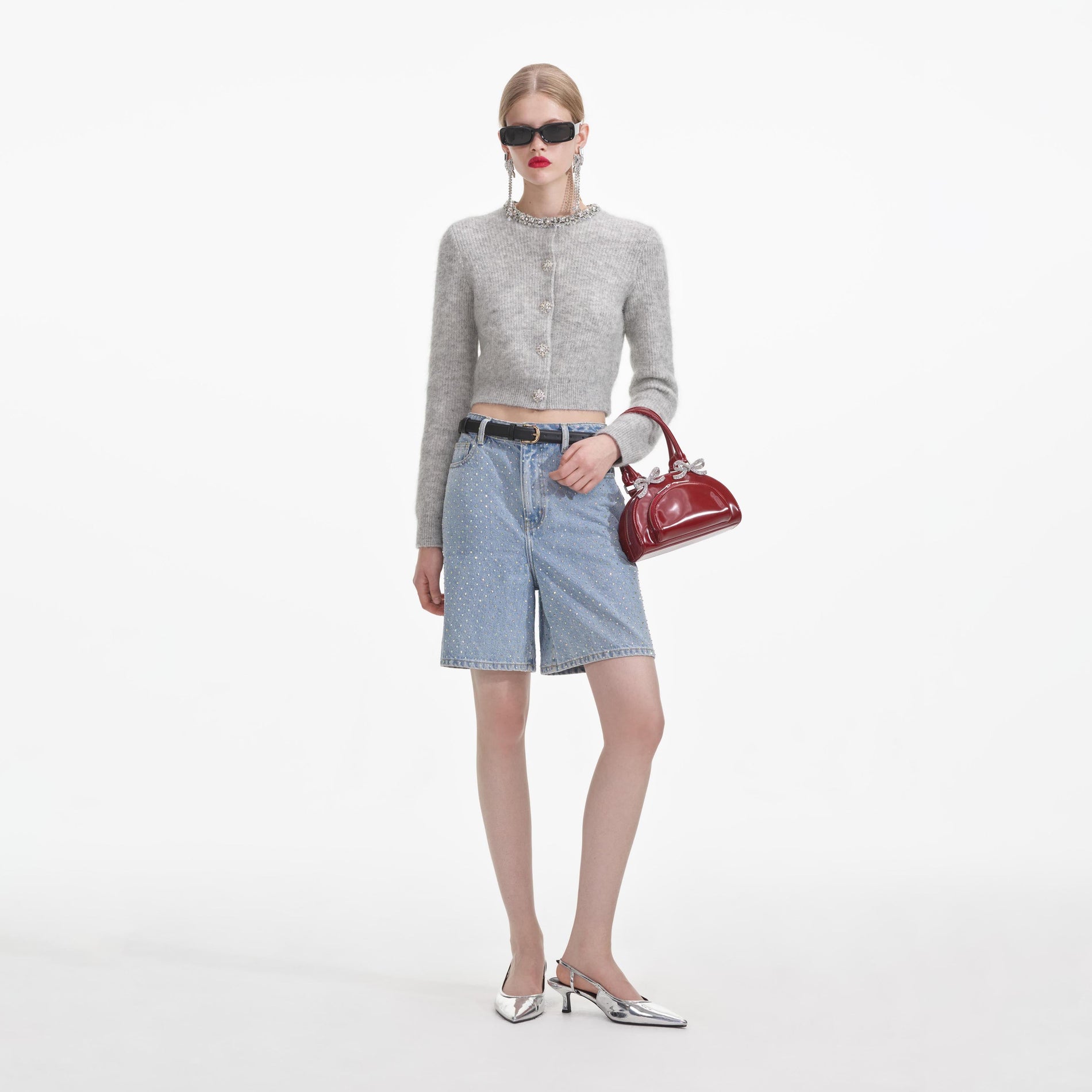 Back view of a woman wearing the Grey Soft Knit Cardigan