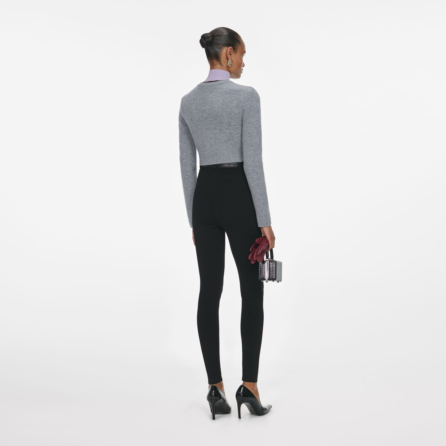 Back view of a woman wearing the Grey Wool Cardigan