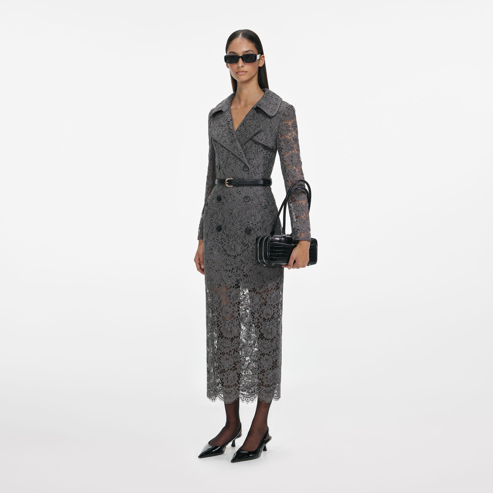 Side view of a woman wearing the Grey Floral Lace Midi Dress