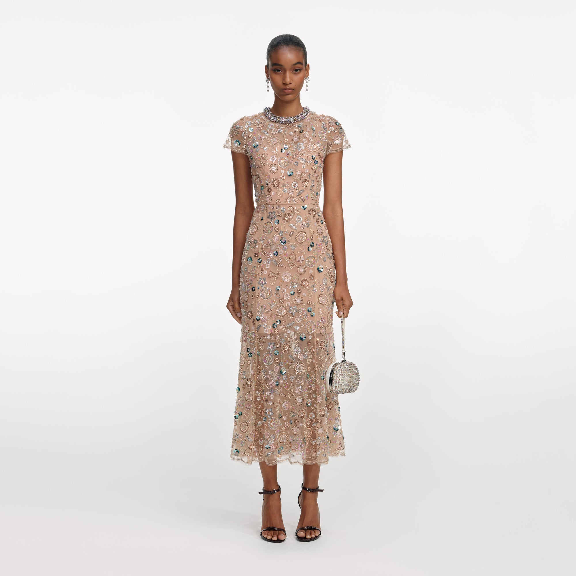 Front view of a woman wearing the Champagne Sequin Embroidered Midi Dress