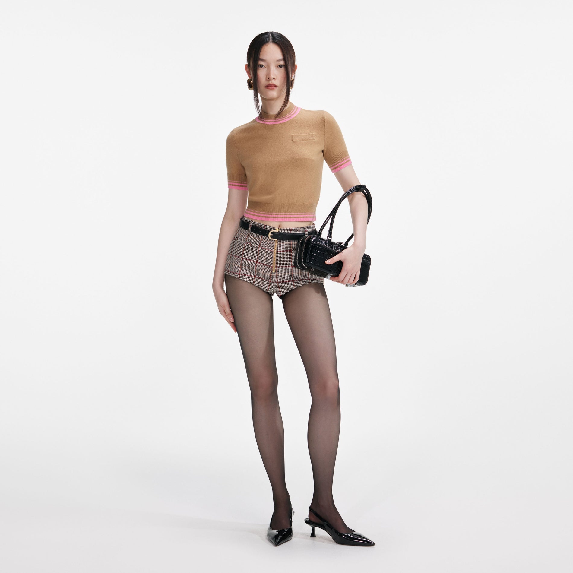 Front view of a woman wearing the Brown Contrast Stripe Knit Top