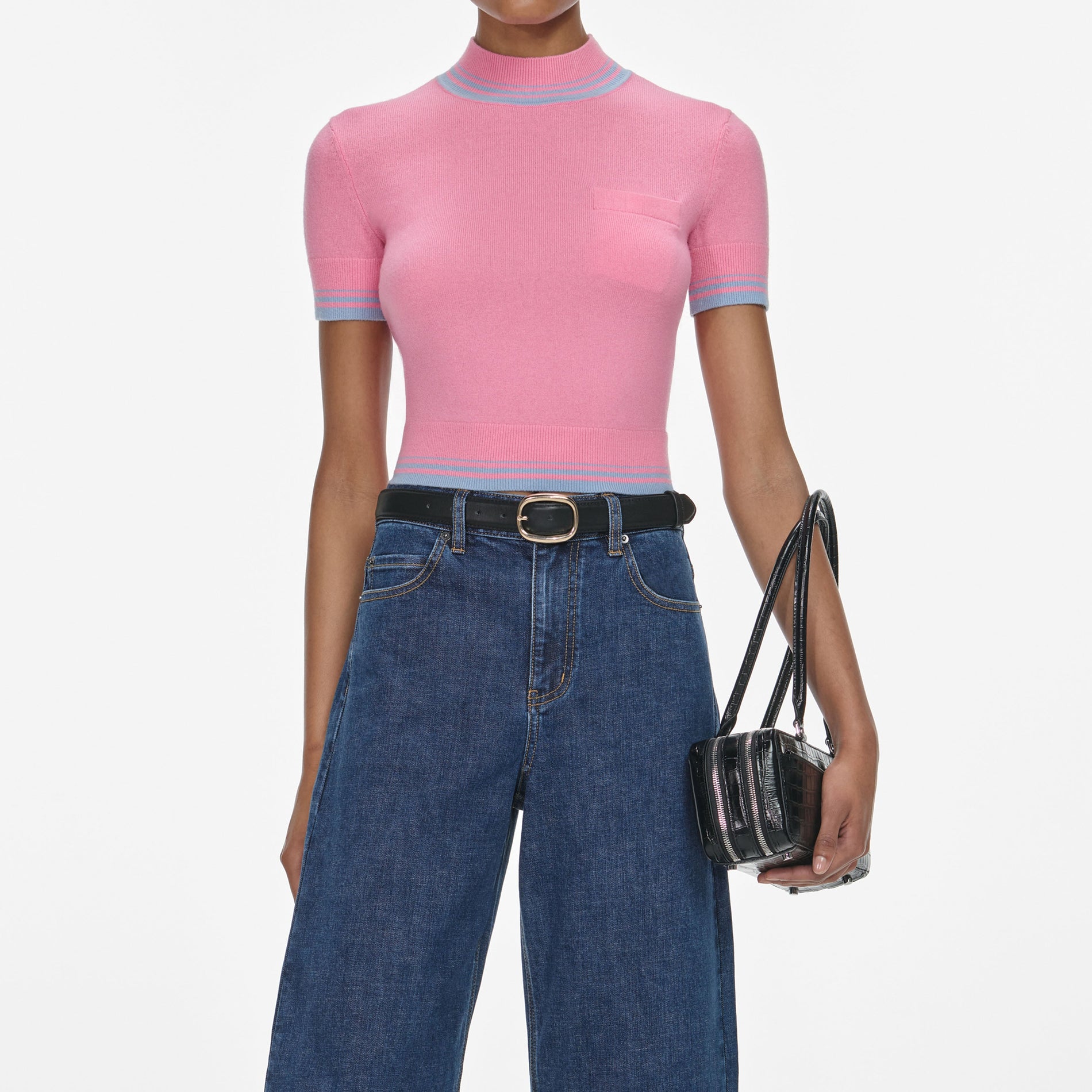 A close up of a woman wearing the Blue Barrel Leg Jeans