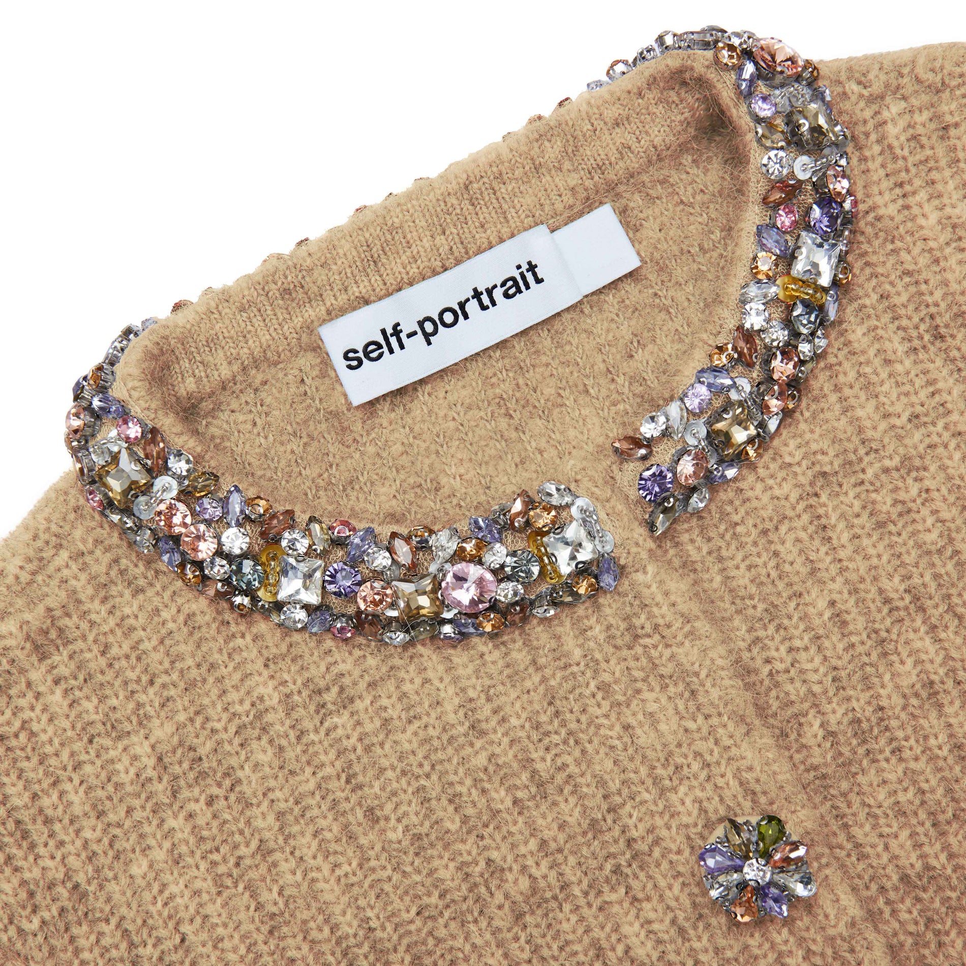 A close up of the fabric for the Brown Embellished Trim Cardigan