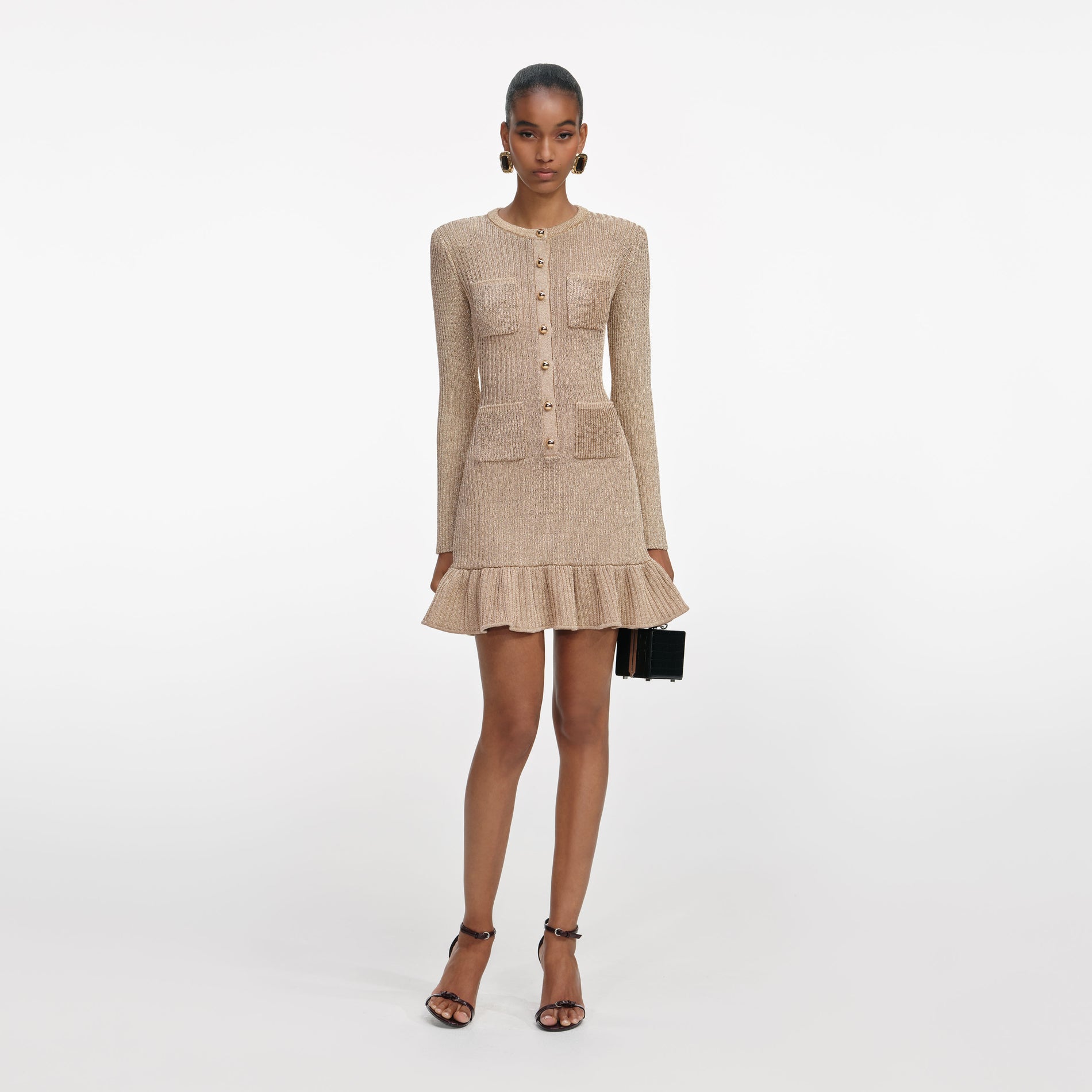 Front view of a woman wearing the Gold Lurex Knit Mini Dress
