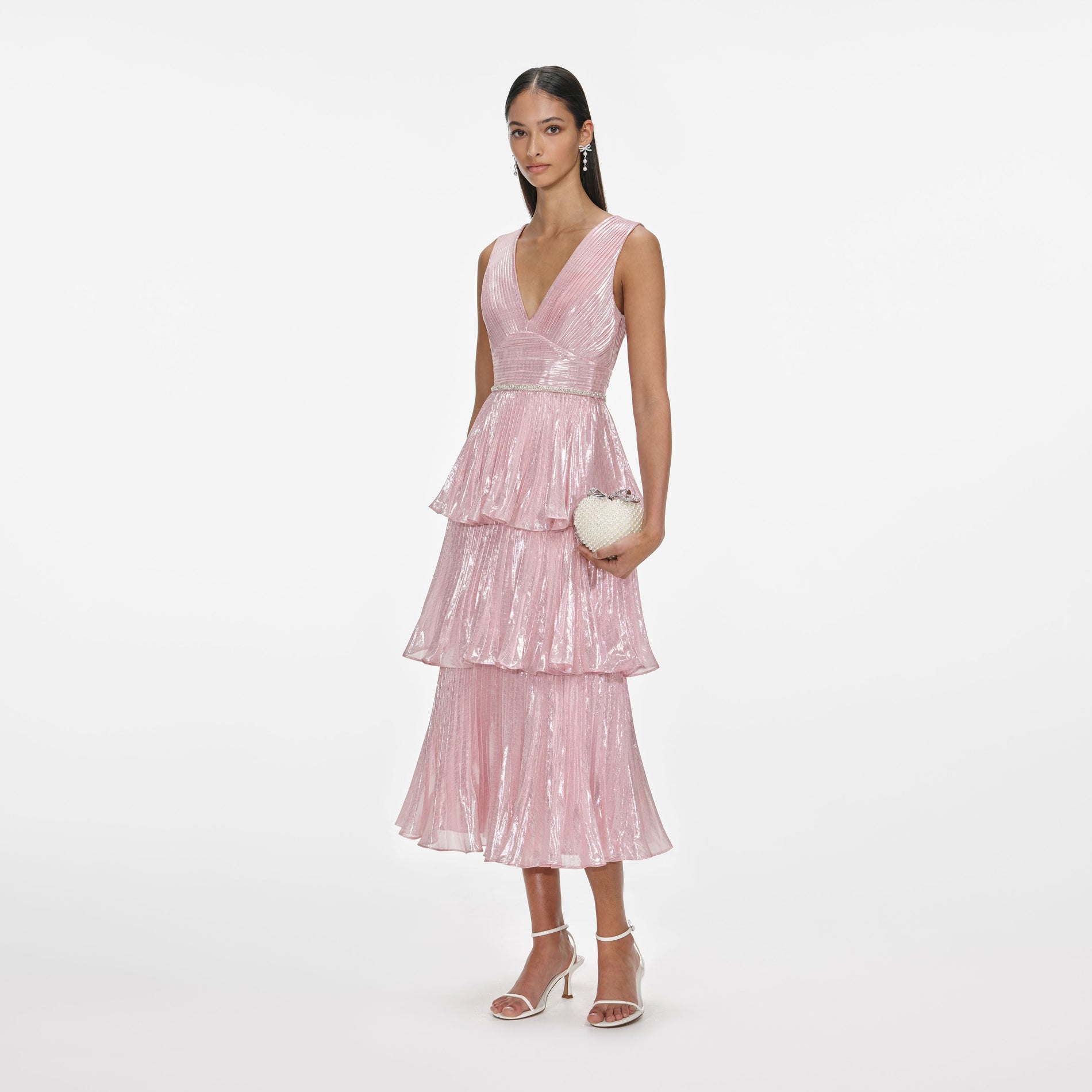Side view of a woman wearing the Pink Metallic Tiered Midi Dress