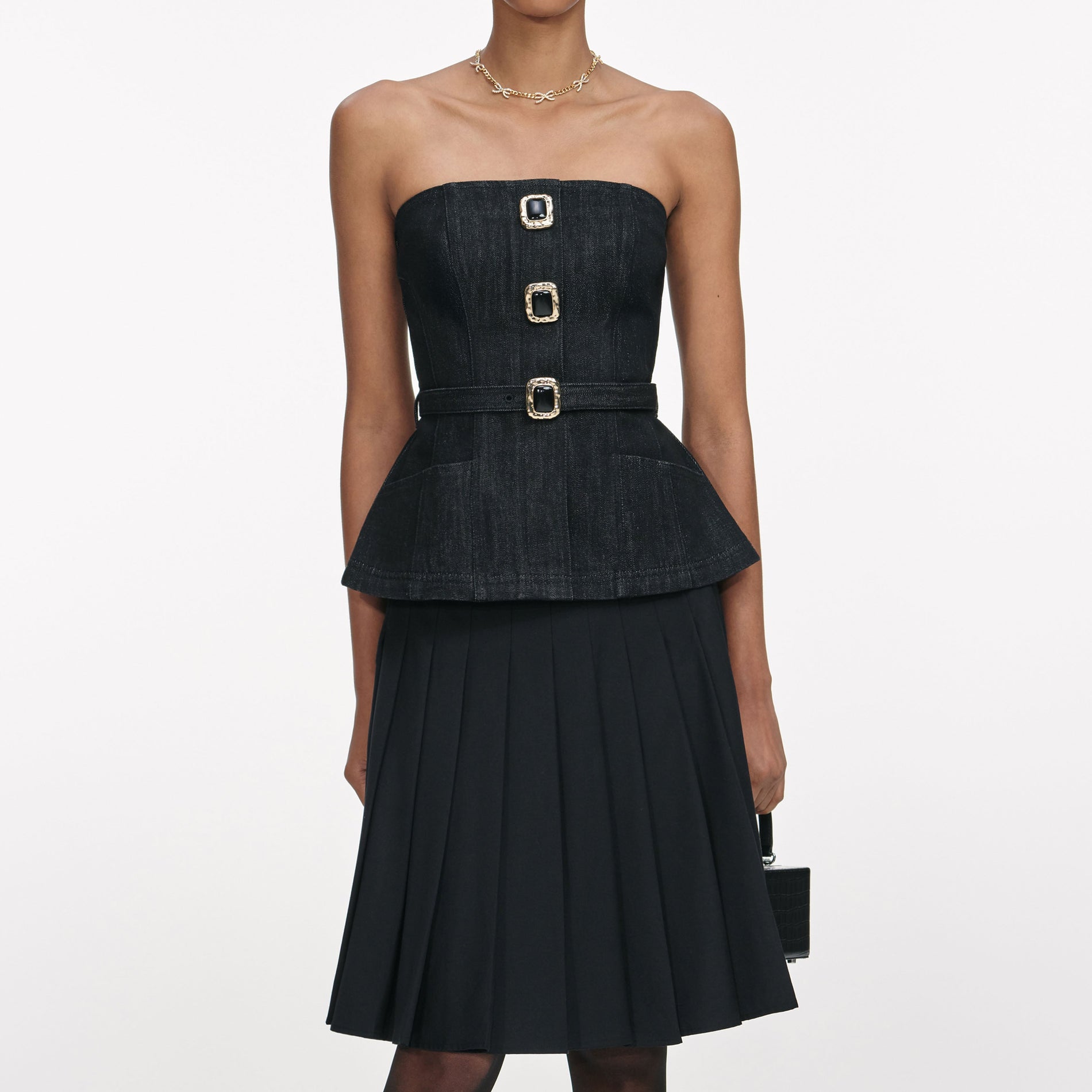 A close up of a woman wearing the Brown Check Chiffon Blouse