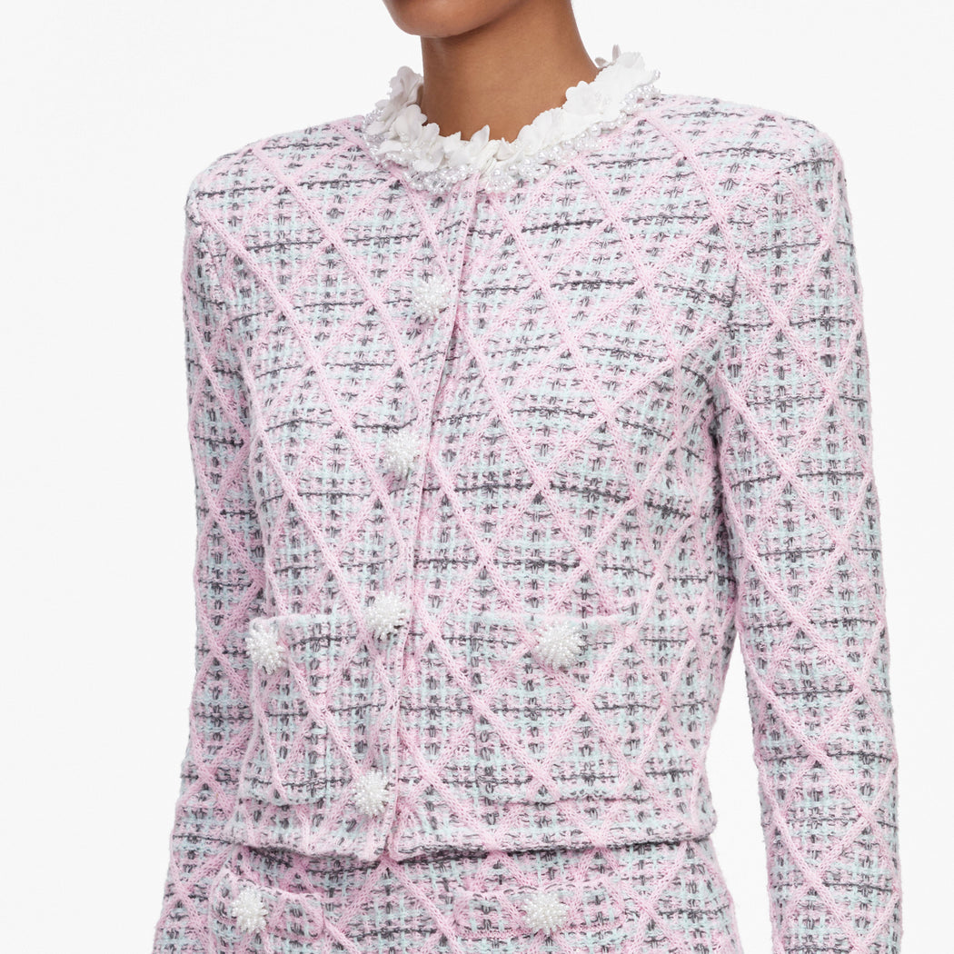 Pink and blue tweed jacket with pearl buttons and a ruffled collar