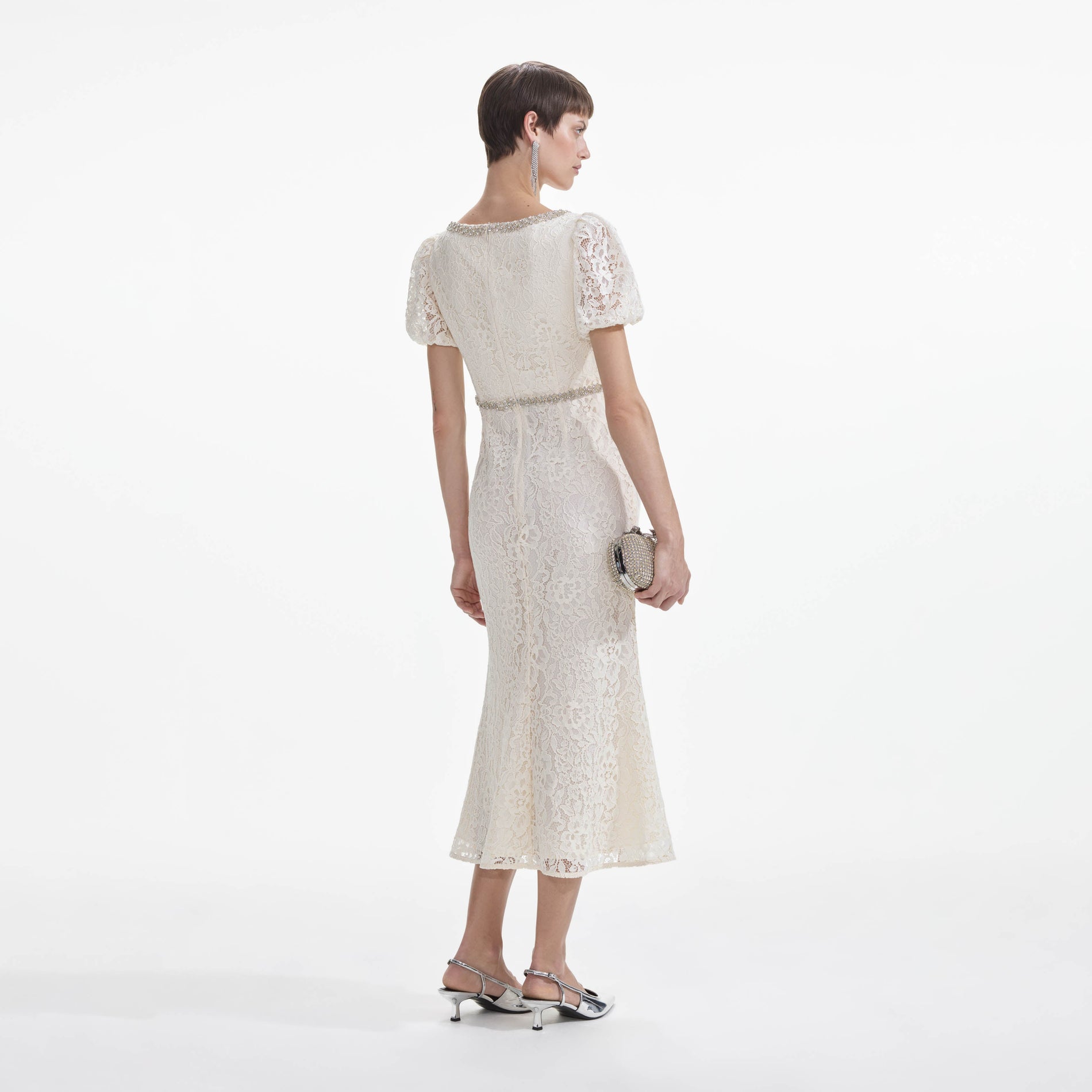 Back view of a woman wearing the Cream Lace Diamante Trim Midi Dress