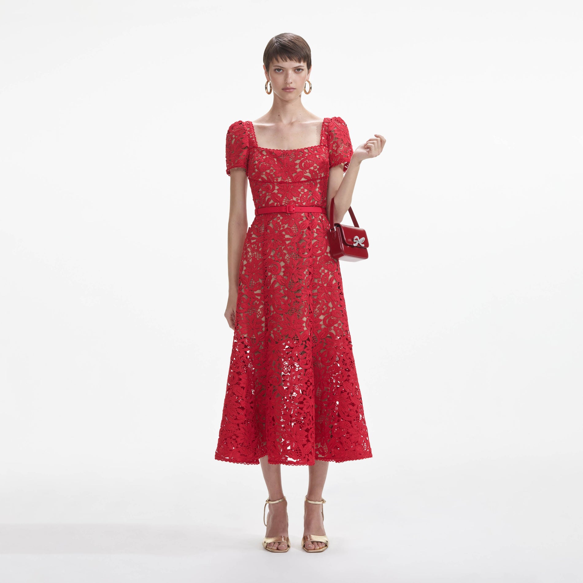 Front view of a woman wearing the Red Floral Lace Midi Dress