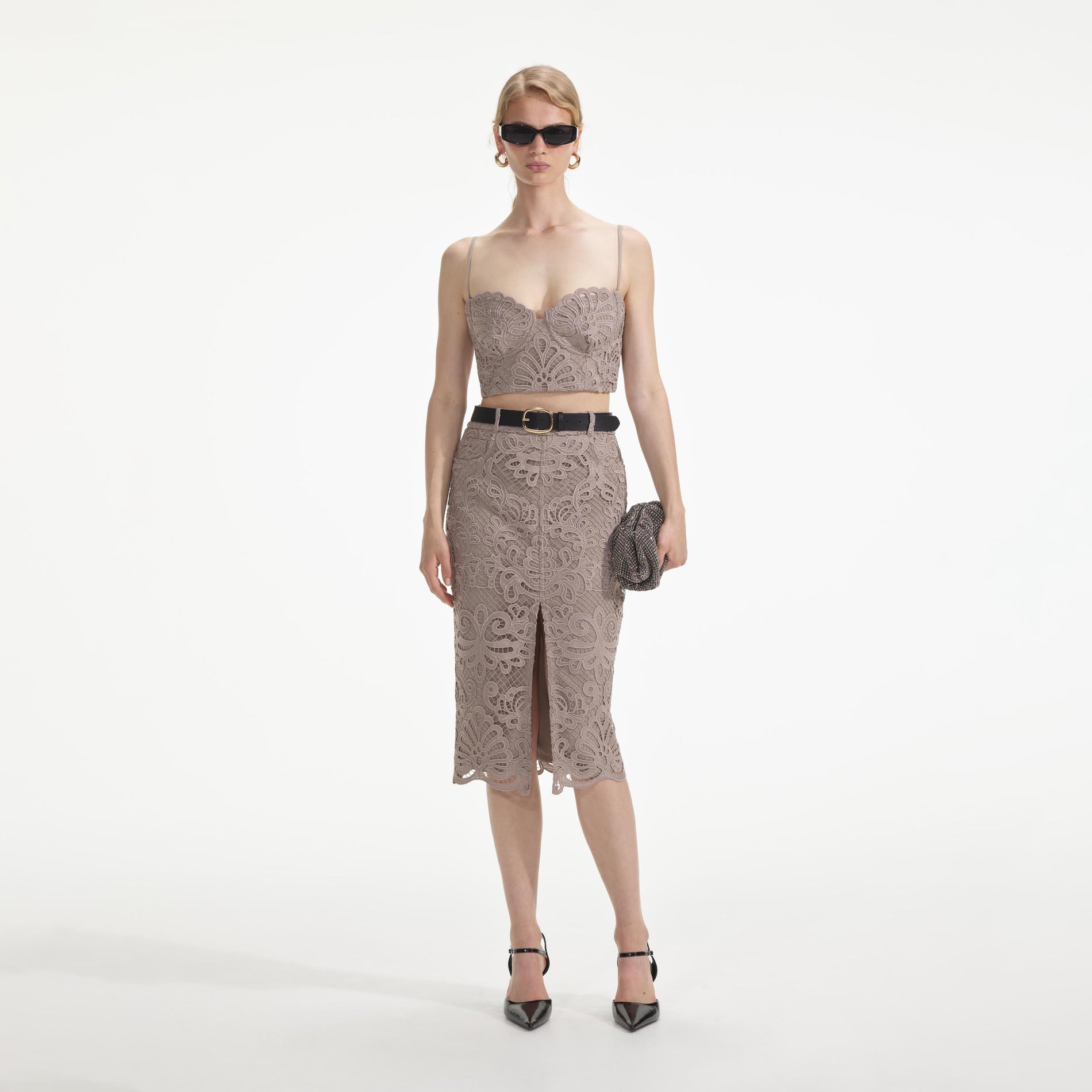 Front view of a woman wearing the Guipure Lace Midi Skirt
