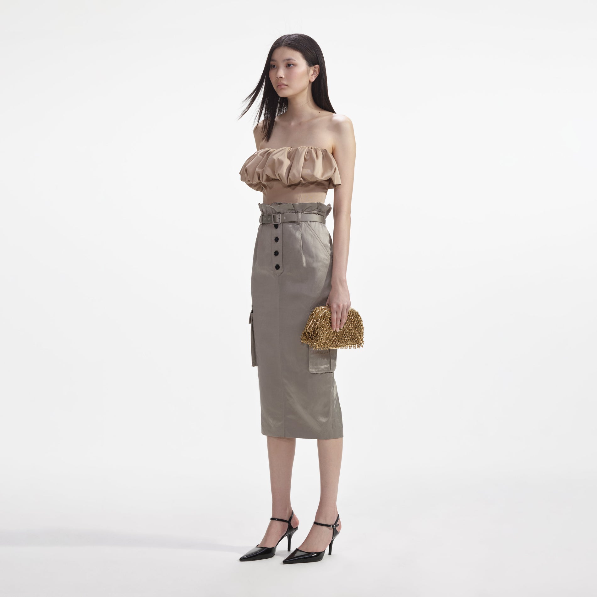 Side view of a woman wearing the Beige Taffeta Bandeau Top