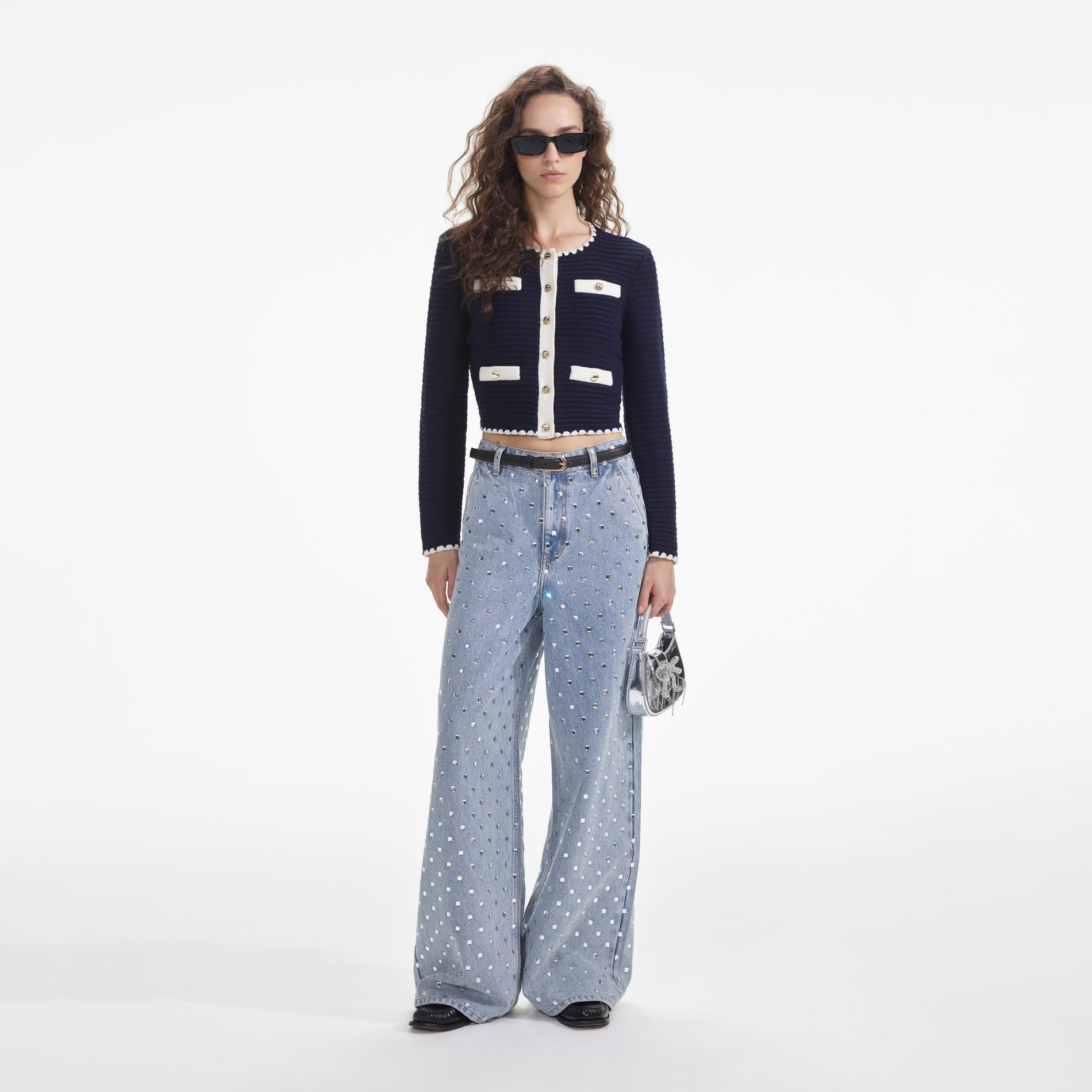 Front view of a woman wearing the Navy Crochet Contrast Trim Cardigan