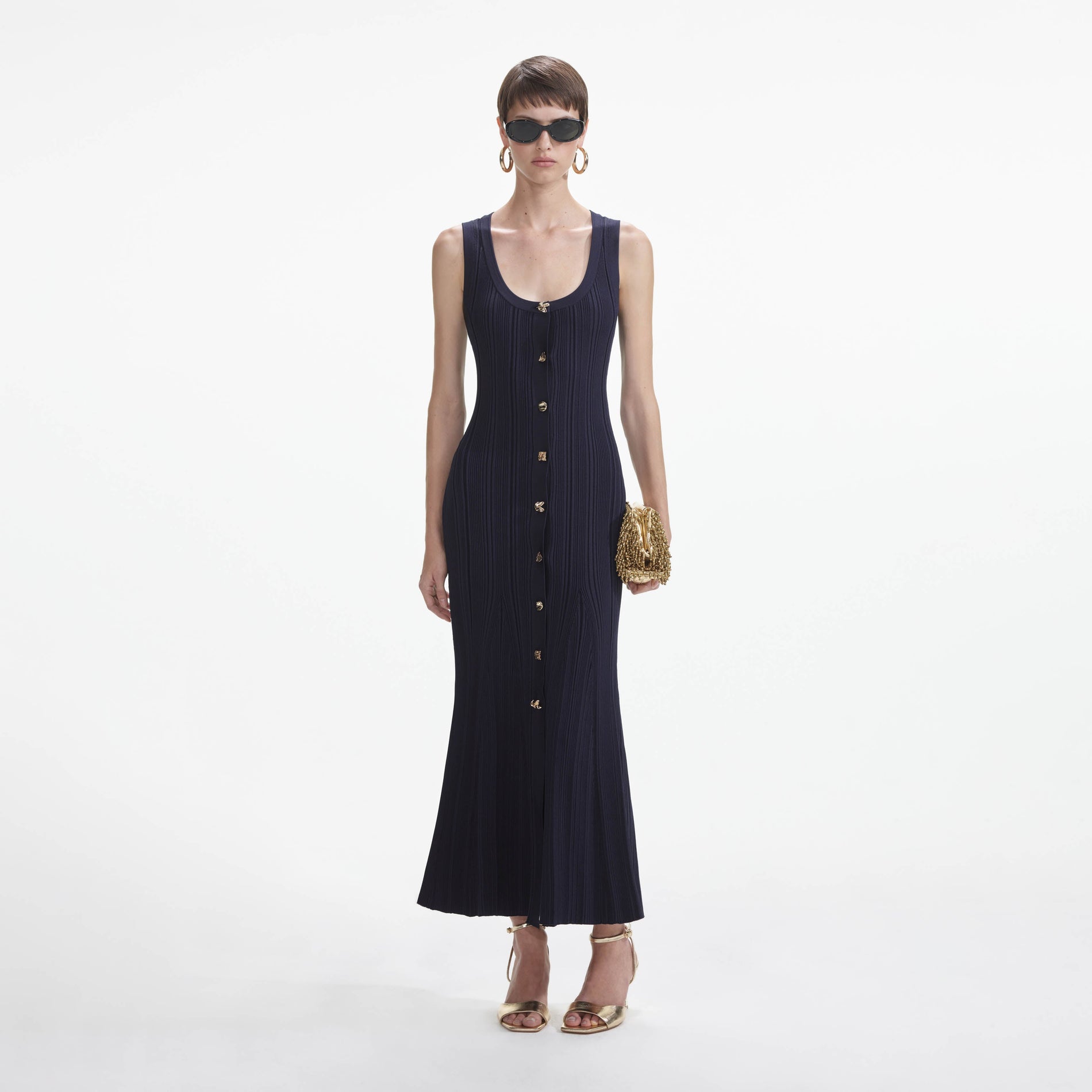 Front view of a woman wearing the Navy Viscose Knit Midi Dress