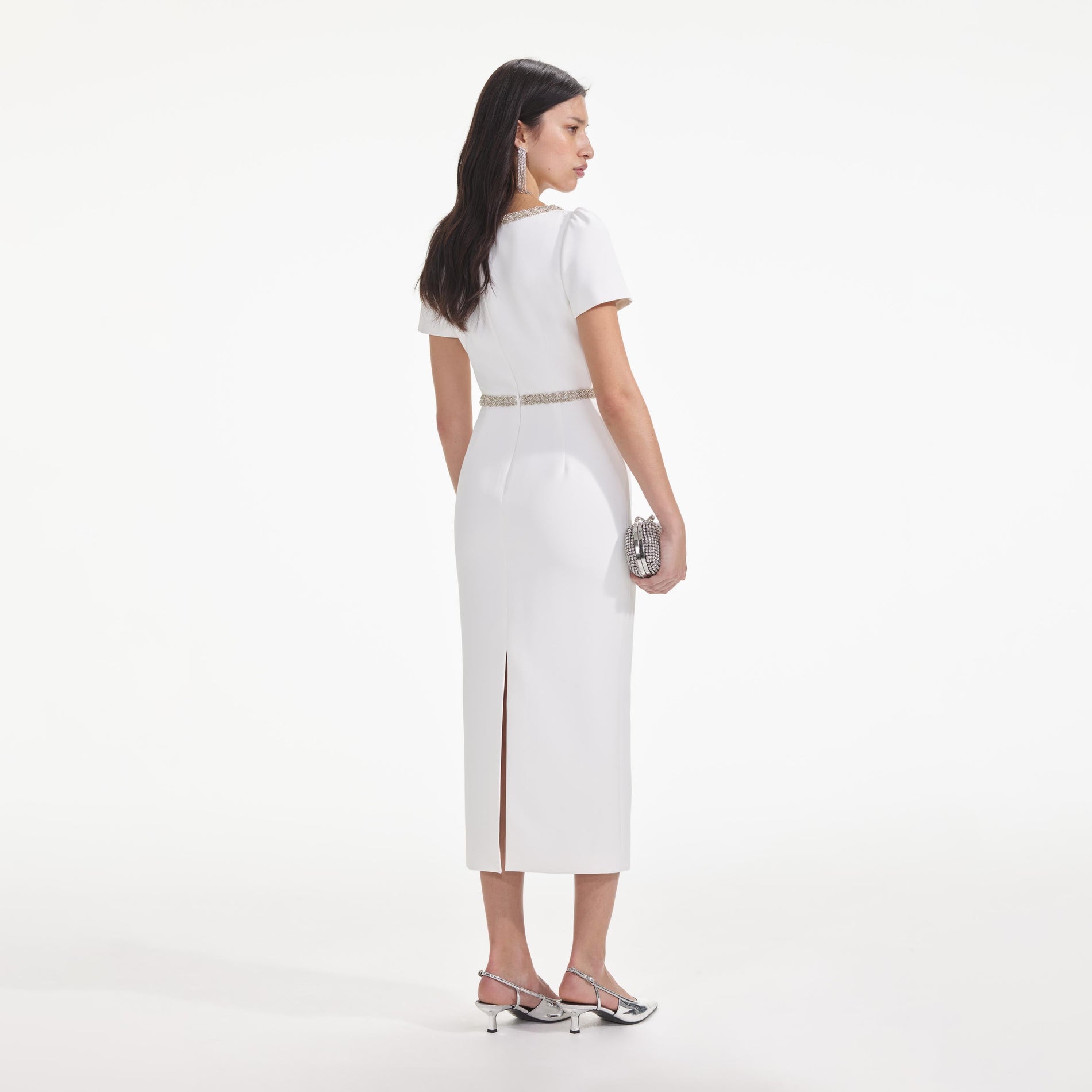 Back view of a woman wearing the White Diamante Bow Trim Midi Dress