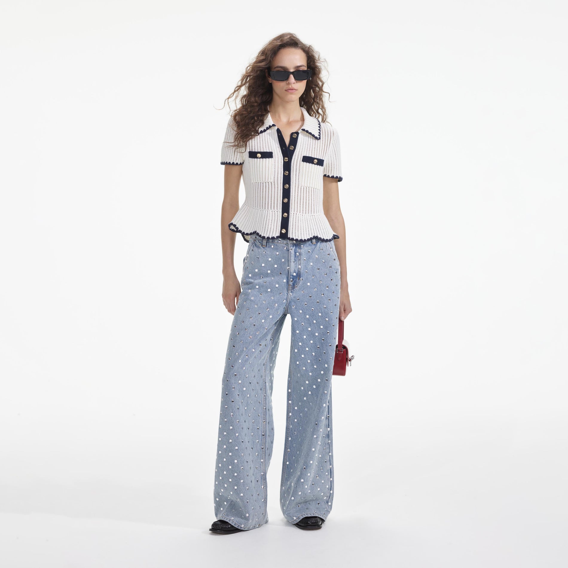 Front view of a woman wearing the Cream Crochet Top