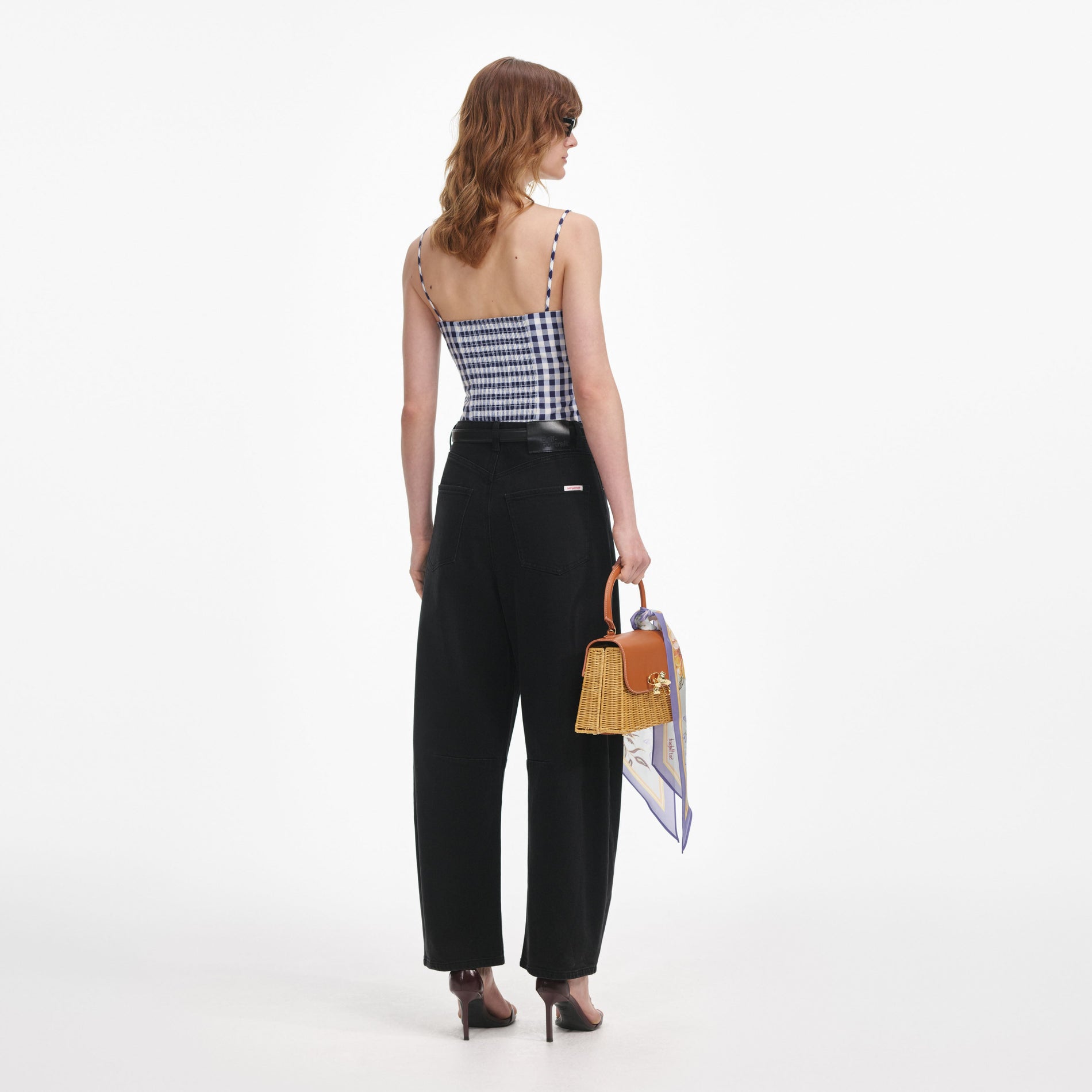 Back view of a woman wearing the Navy Gingham Taffeta Top