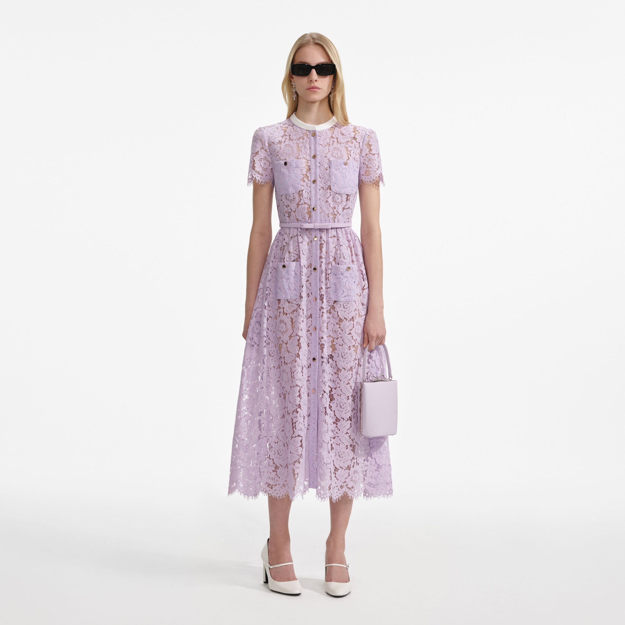 Front view of a woman wearing the Lilac Lace Button Front Midi Dress