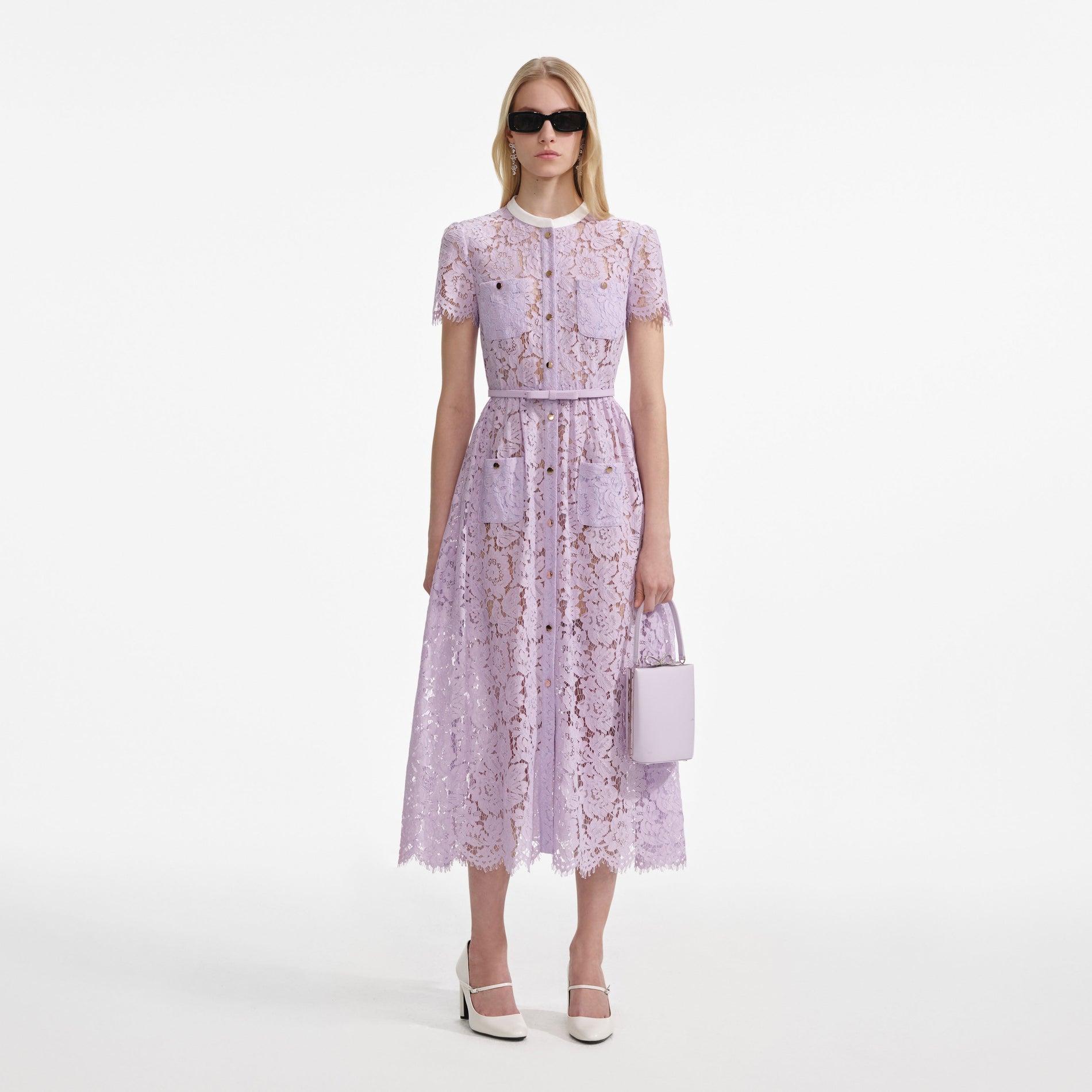 Front view of a woman wearing the Lilac Lace Button Front Midi Dress