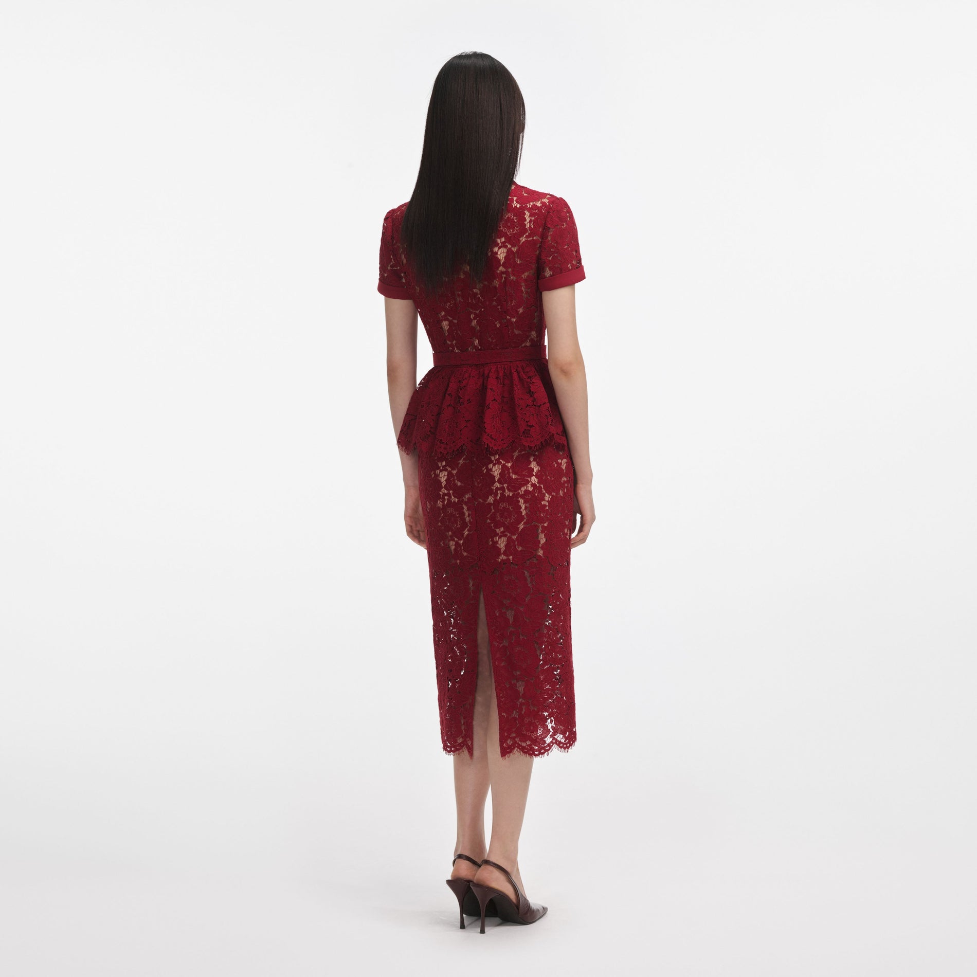 Back view of a woman wearing the Burgundy Lace Peplum Midi Dress