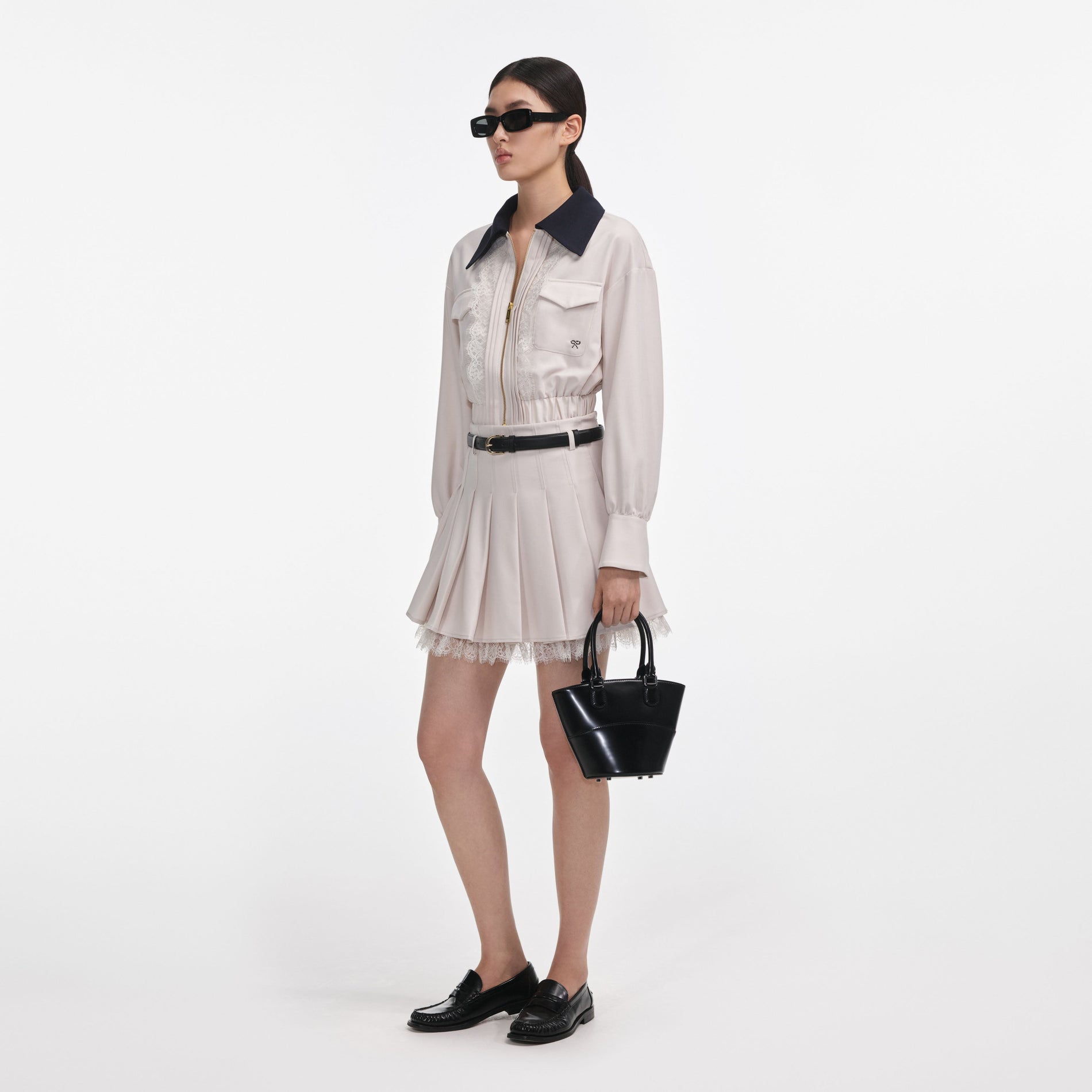 Side view of a woman wearing the Cream Twill Contrast Collar Jacket