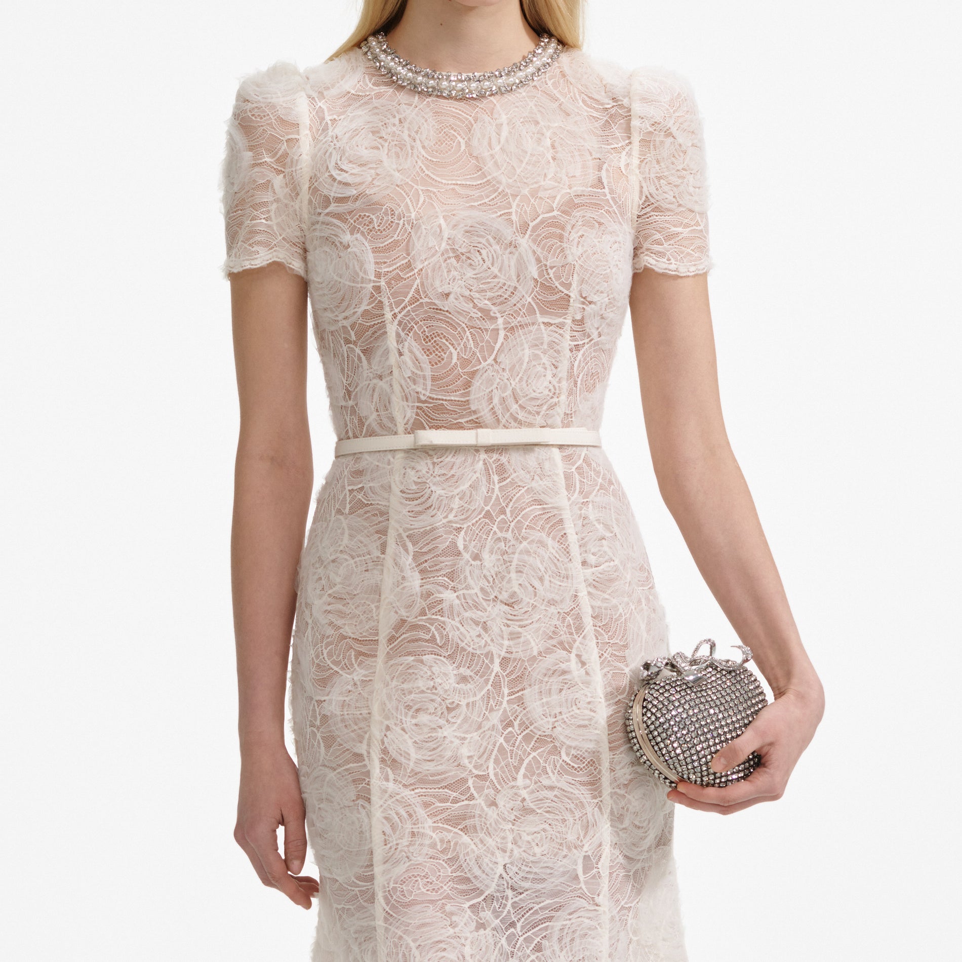 A close up of a woman wearing the Cream Tulle Lace Midi Dress