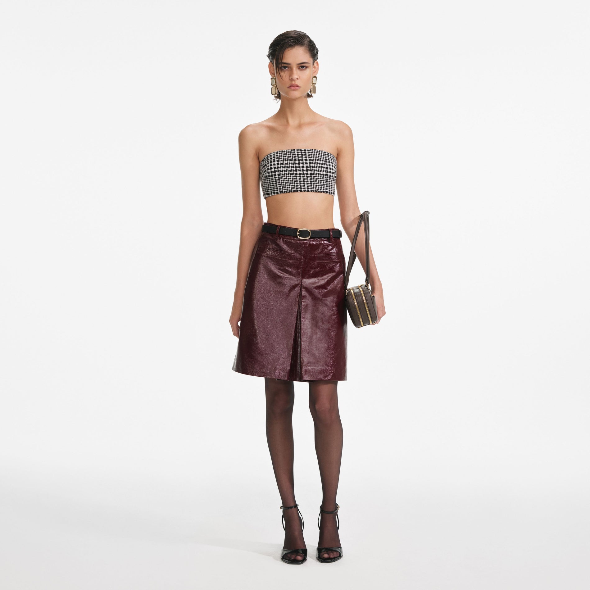 Front view of a woman wearing the Houndstooth Bandeau Top