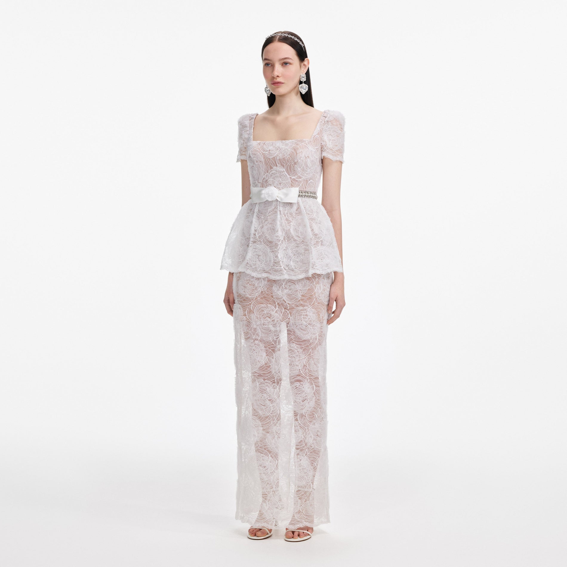 Side view of a woman wearing the White Tulle Lace Maxi Dress