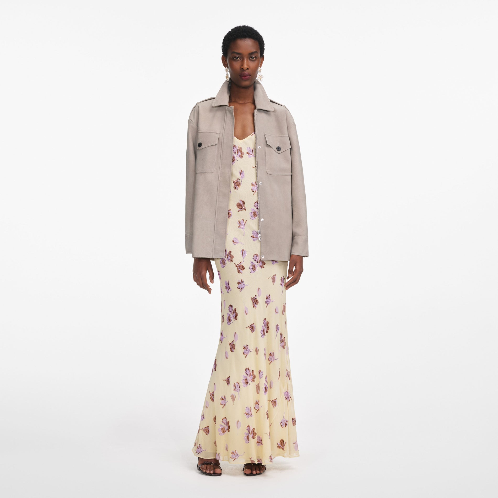 Front view of a woman wearing the Grey Suede Jacket