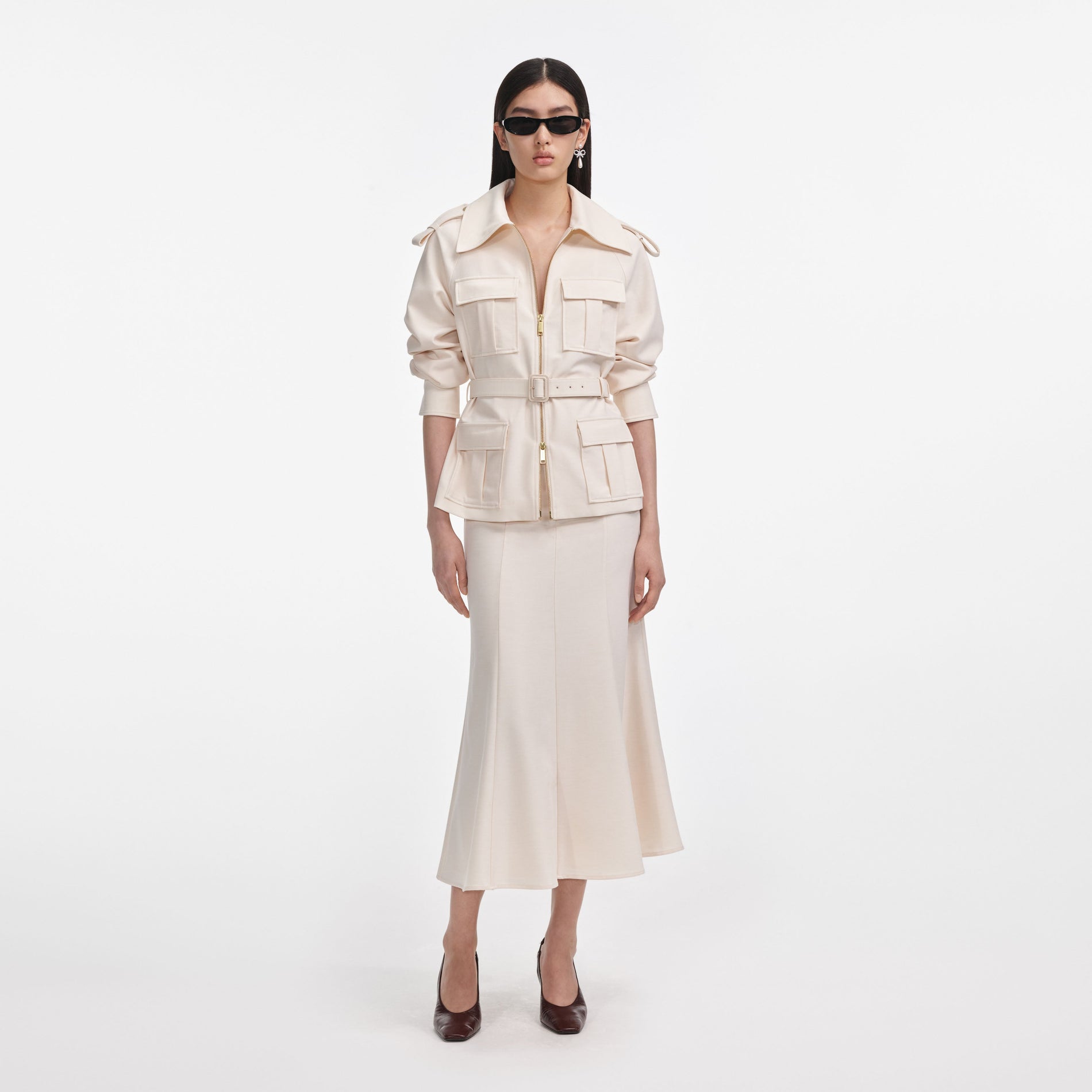 Front view of a woman wearing the Cream Twill Midi Dress