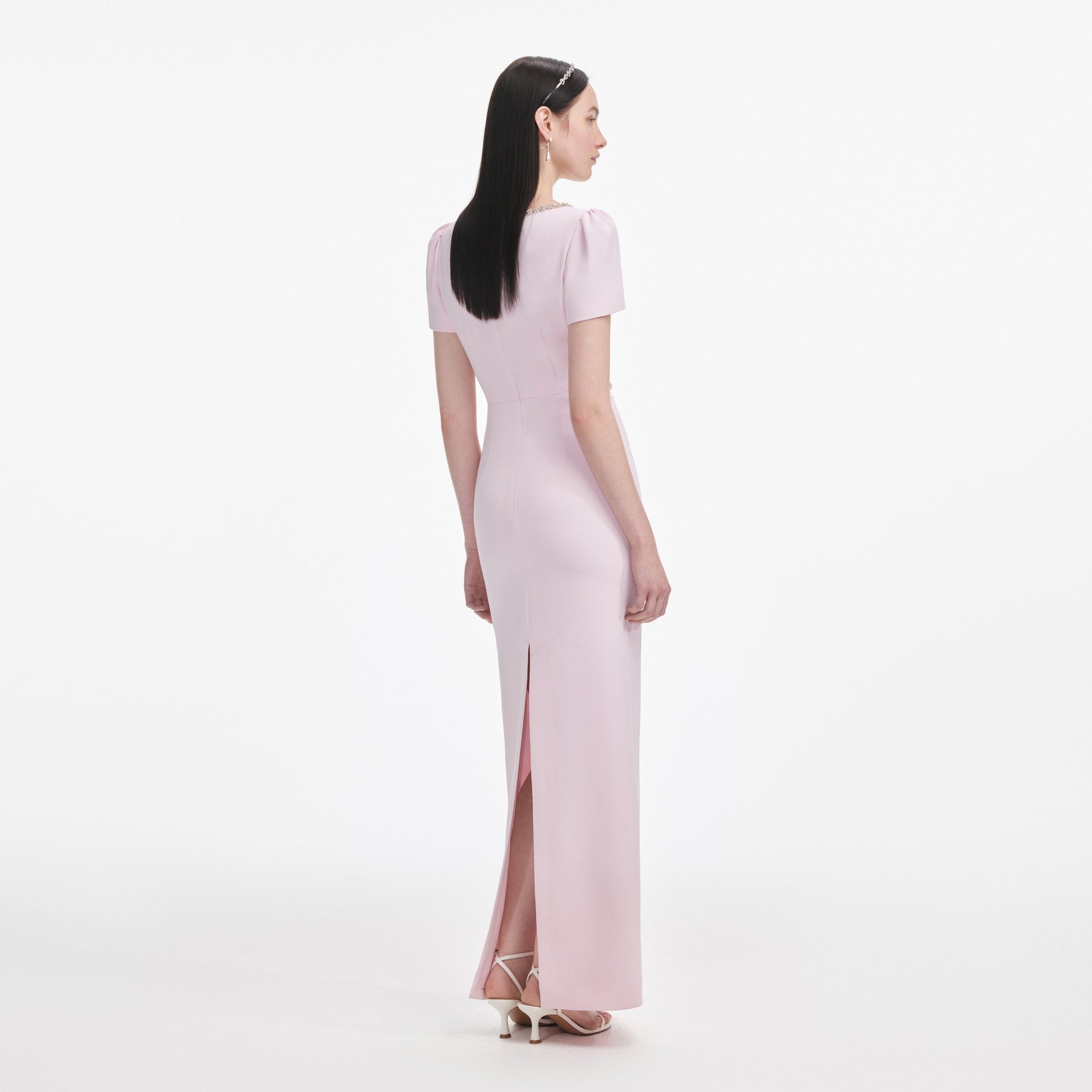Back view of a woman wearing the Pink Crepe Crystal Trim Maxi Dress