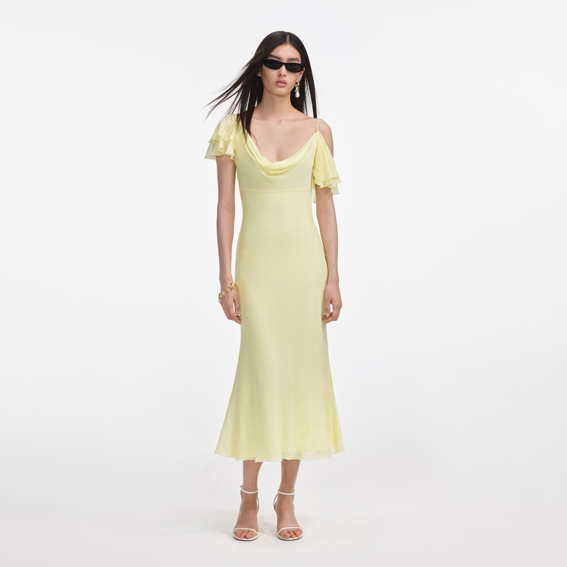 Front view of a woman wearing the Yellow Georgette Frill Midi Dress