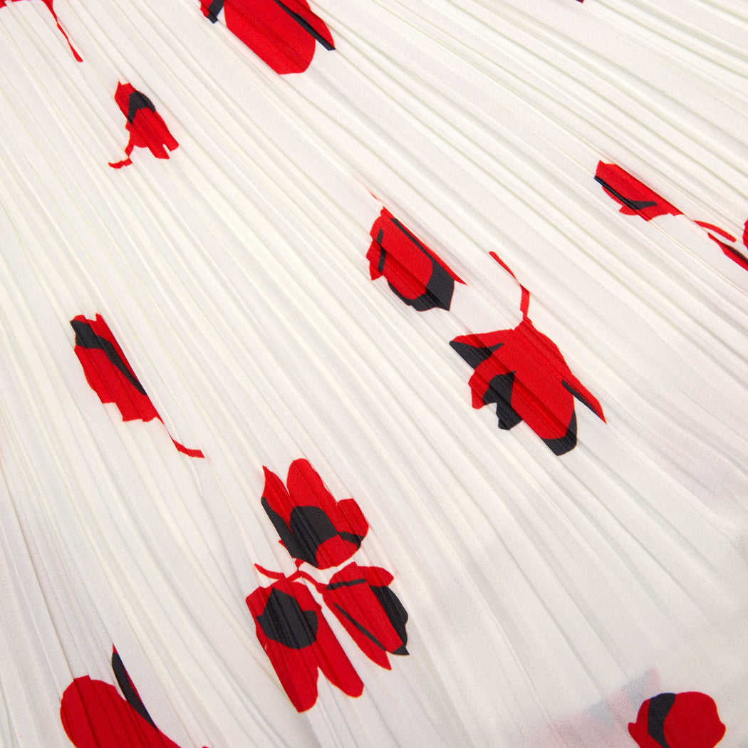 A close up of the fabric for the White Floral Plisse Top