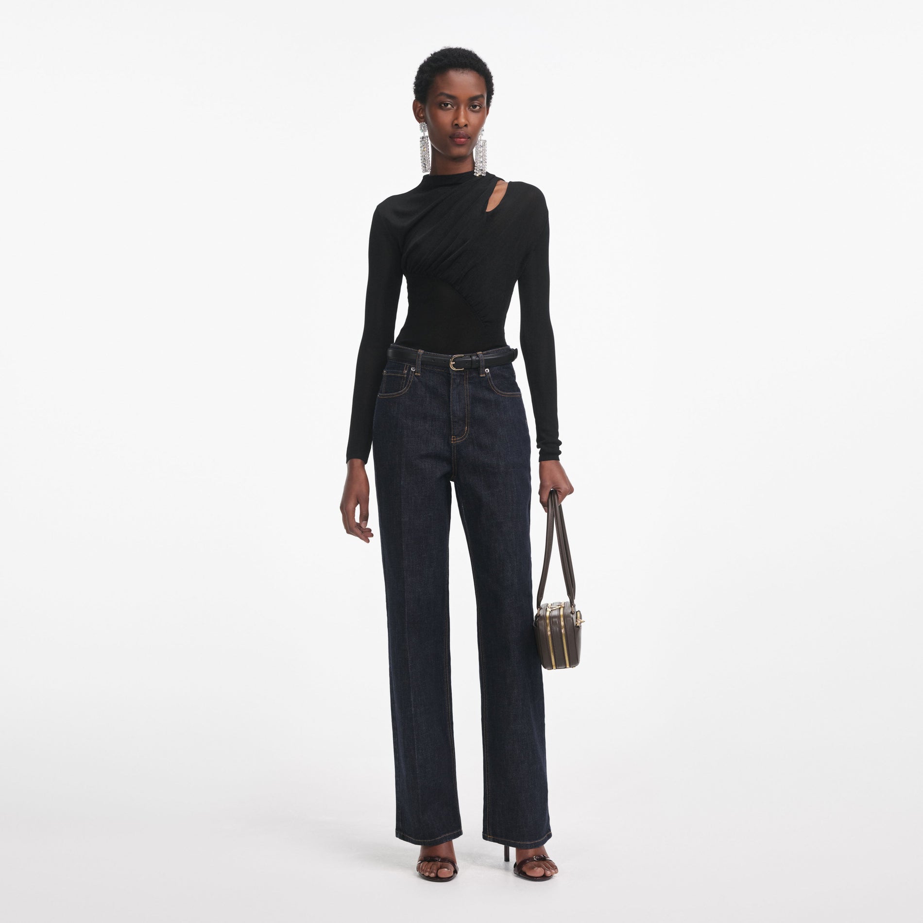 Front view of a woman wearing the Black Cut Out Viscose Knit Top