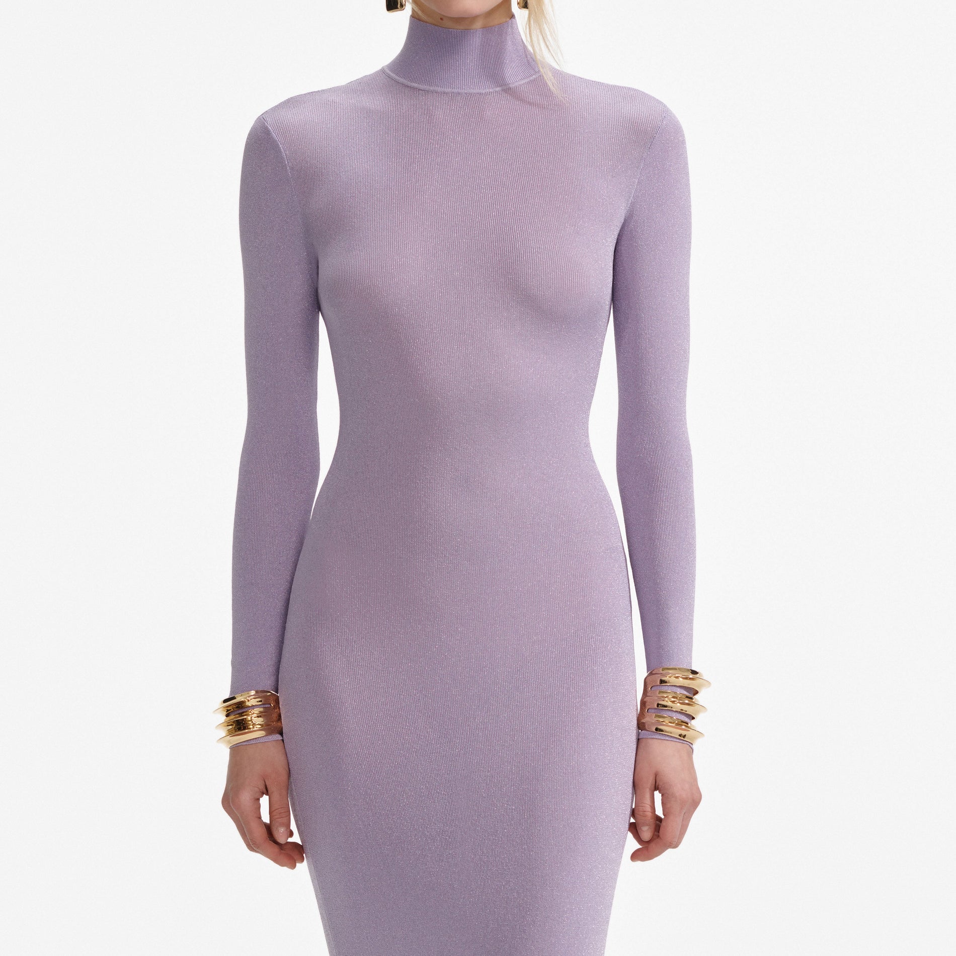 A close up of a woman wearing the Lilac Viscose Knit Maxi Dress