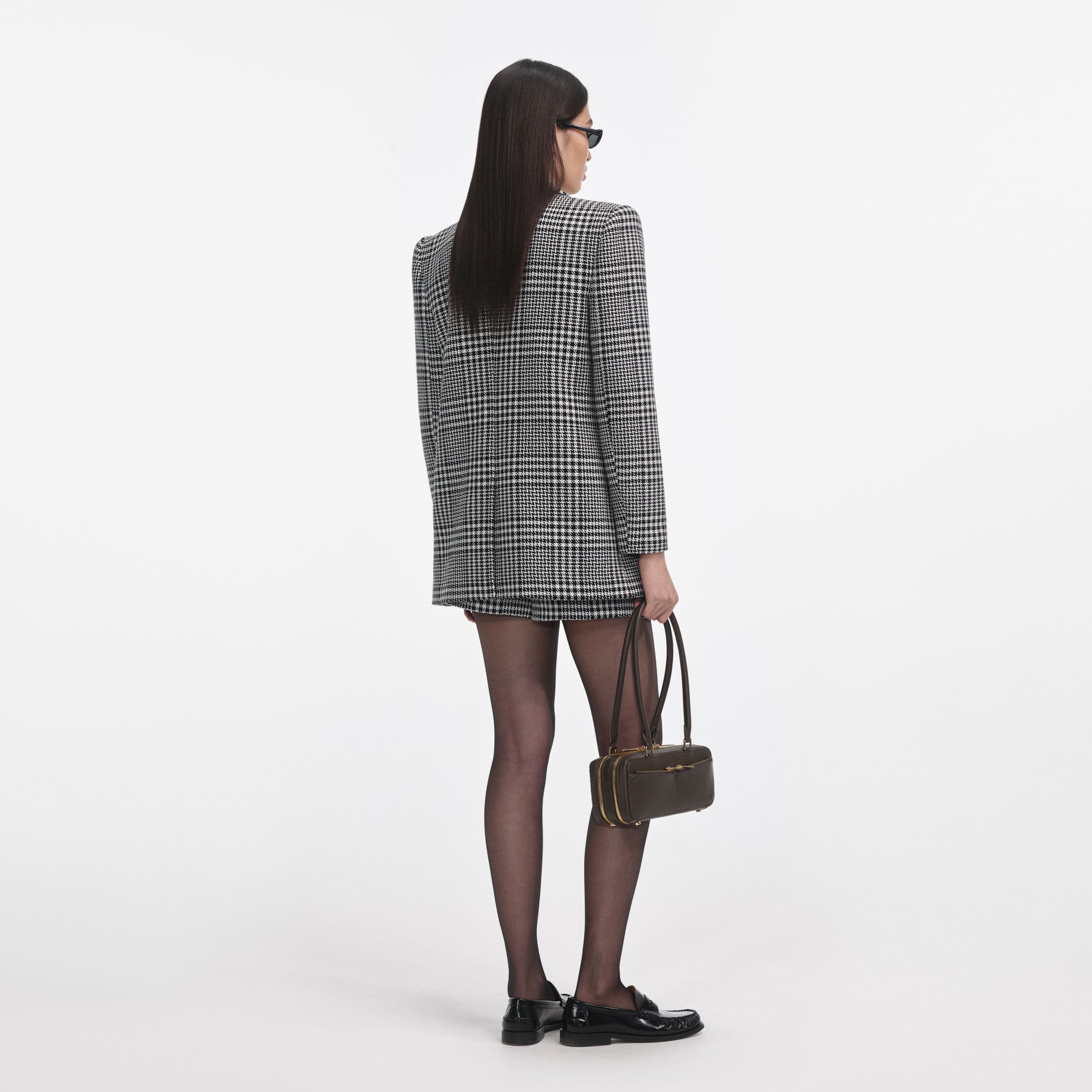 Back view of a woman wearing the Houndstooth Blazer
