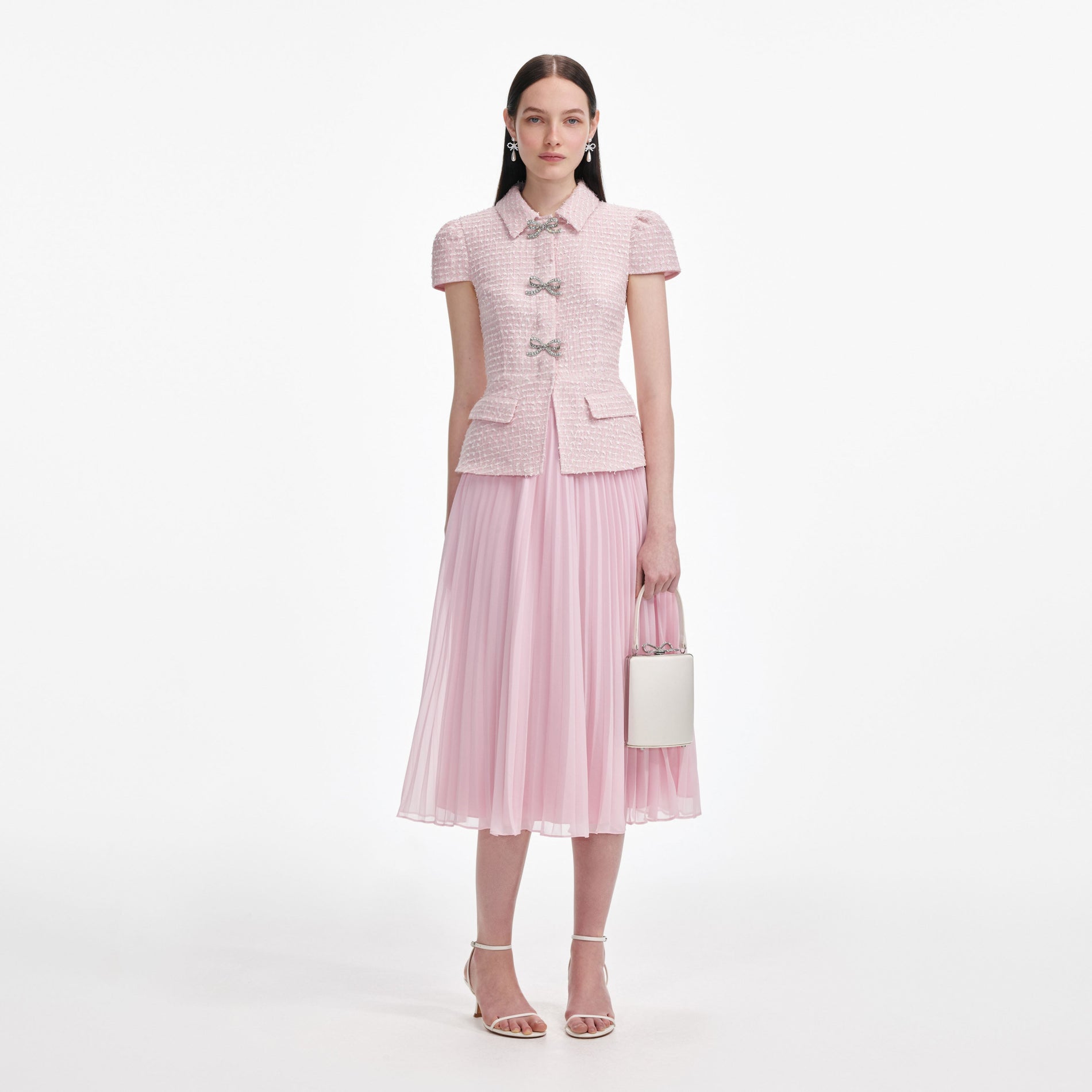 Front view of a woman wearing the Pink Boucle Midi Dress