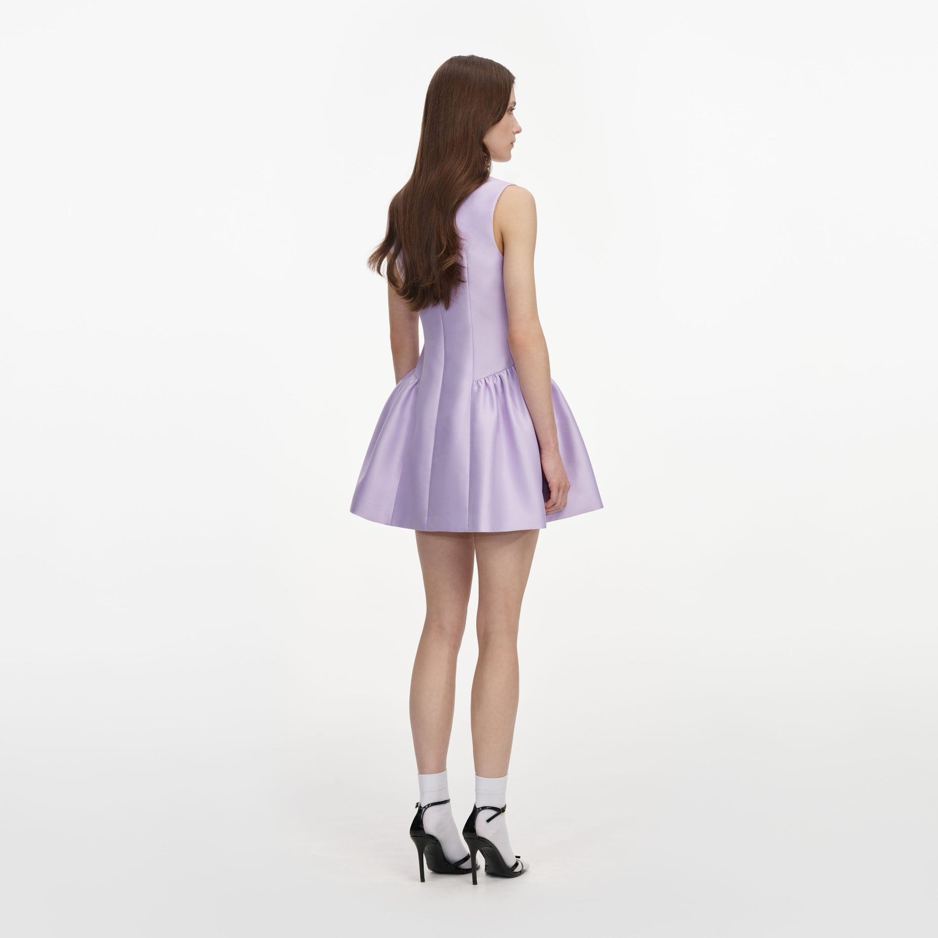 Back view of a woman wearing the Lilac Taffeta Mini Dress