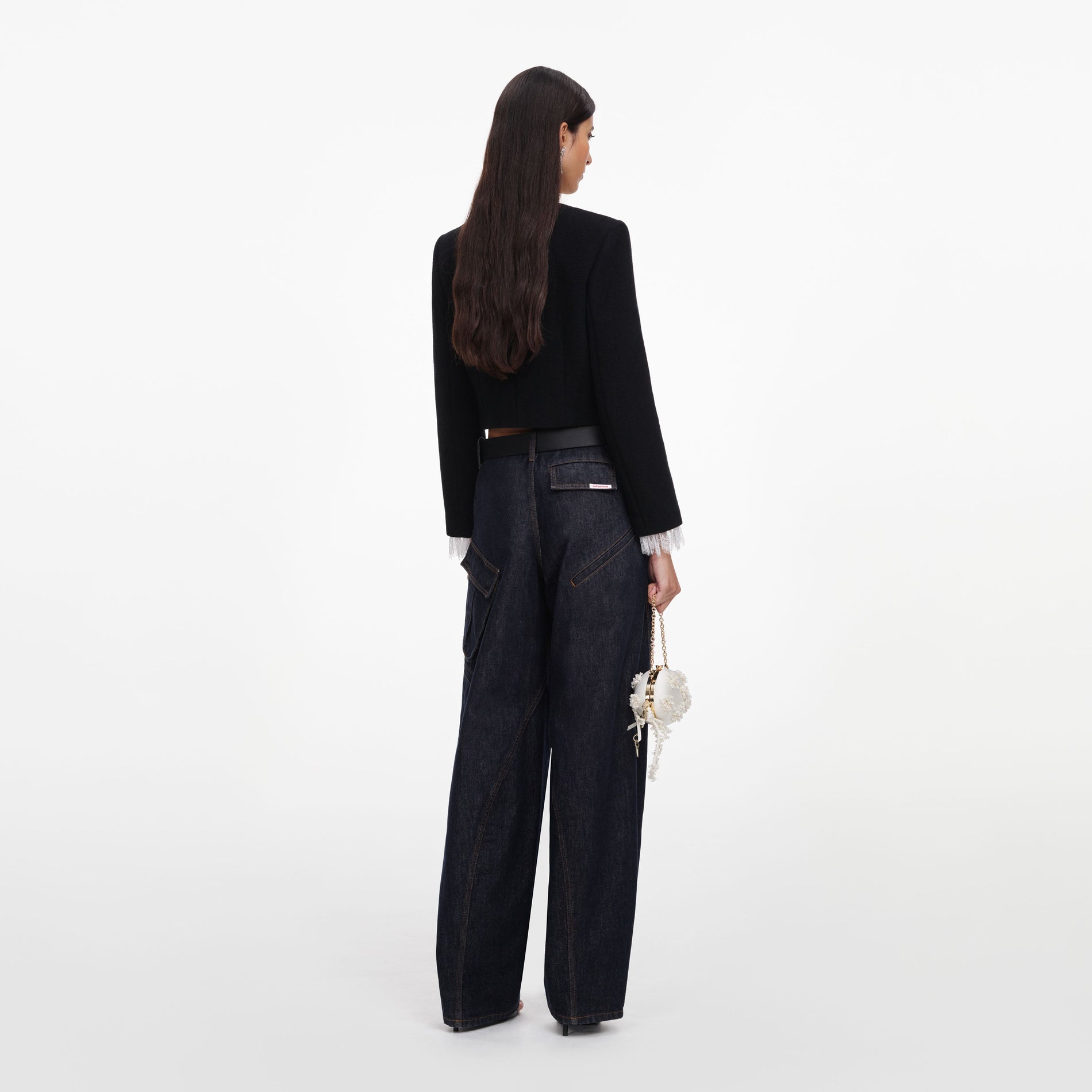 Back view of a woman wearing the Black Button Down Jacket