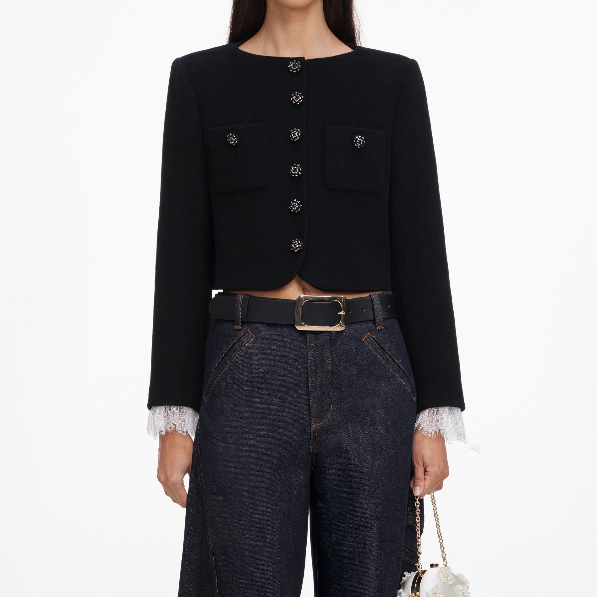 A close up of a woman wearing the Black Button Down Jacket