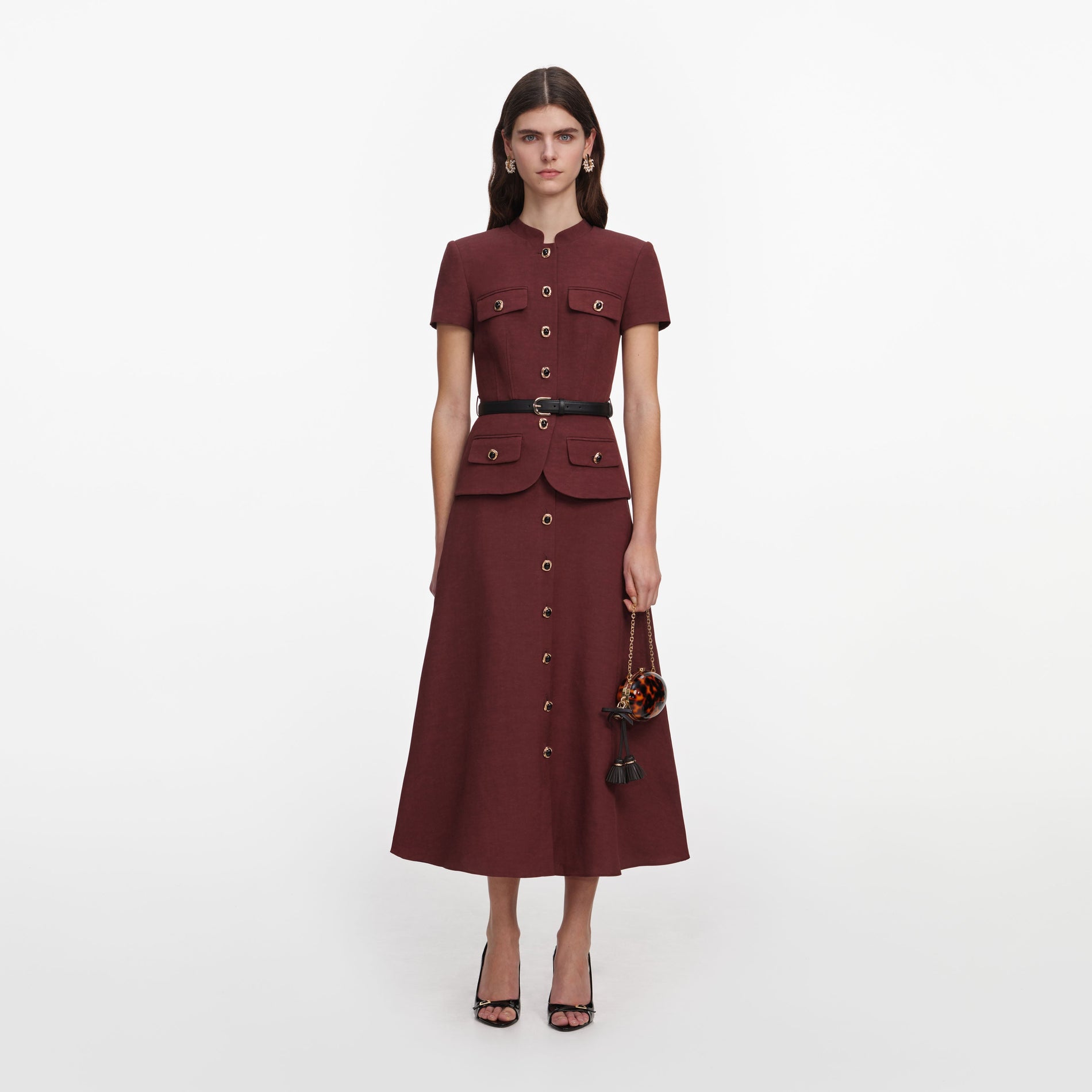 Front view of a woman wearing the Brown Peplum Linen Blend Midi Dress