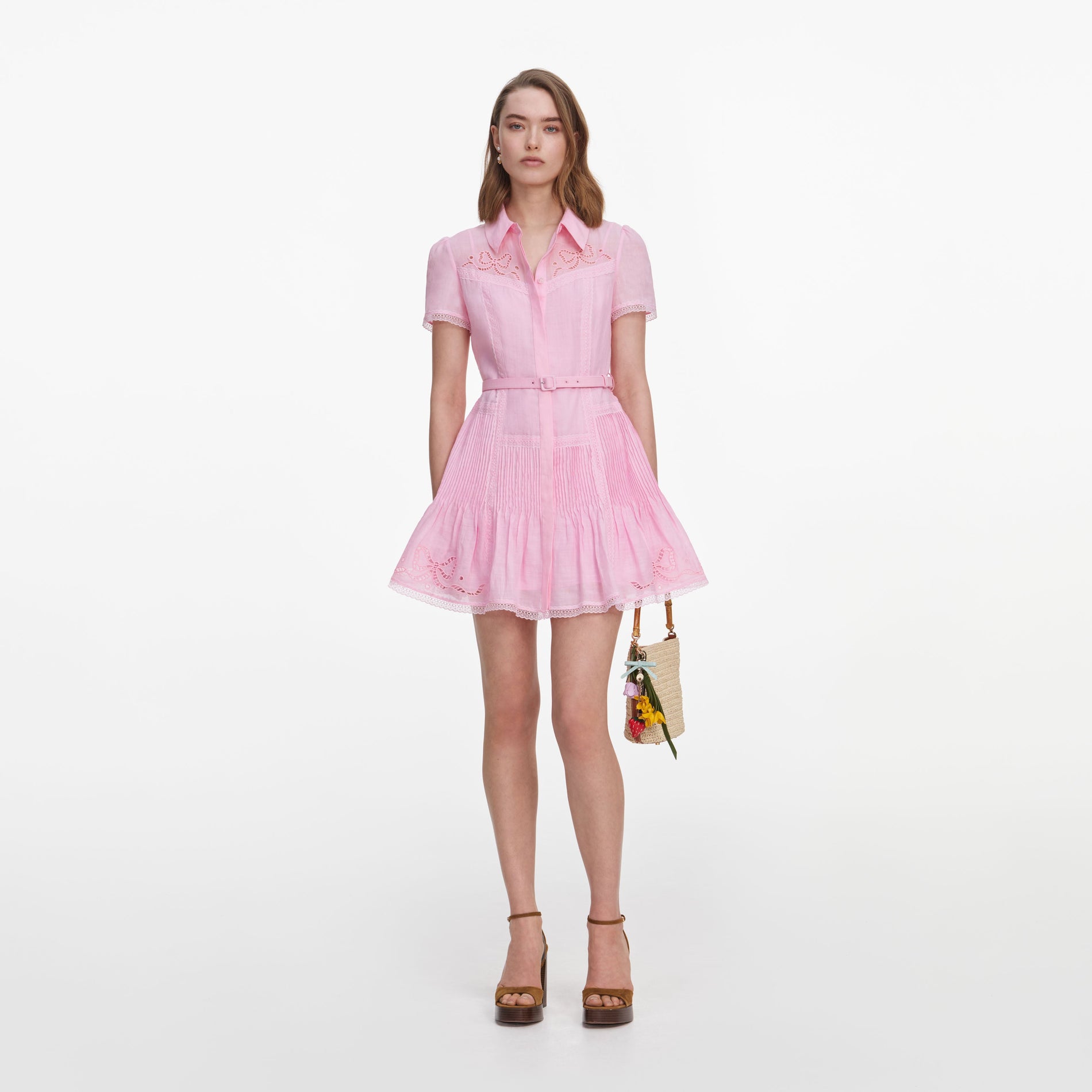 Front view of a woman wearing the Pink Embroidered Mini Dress